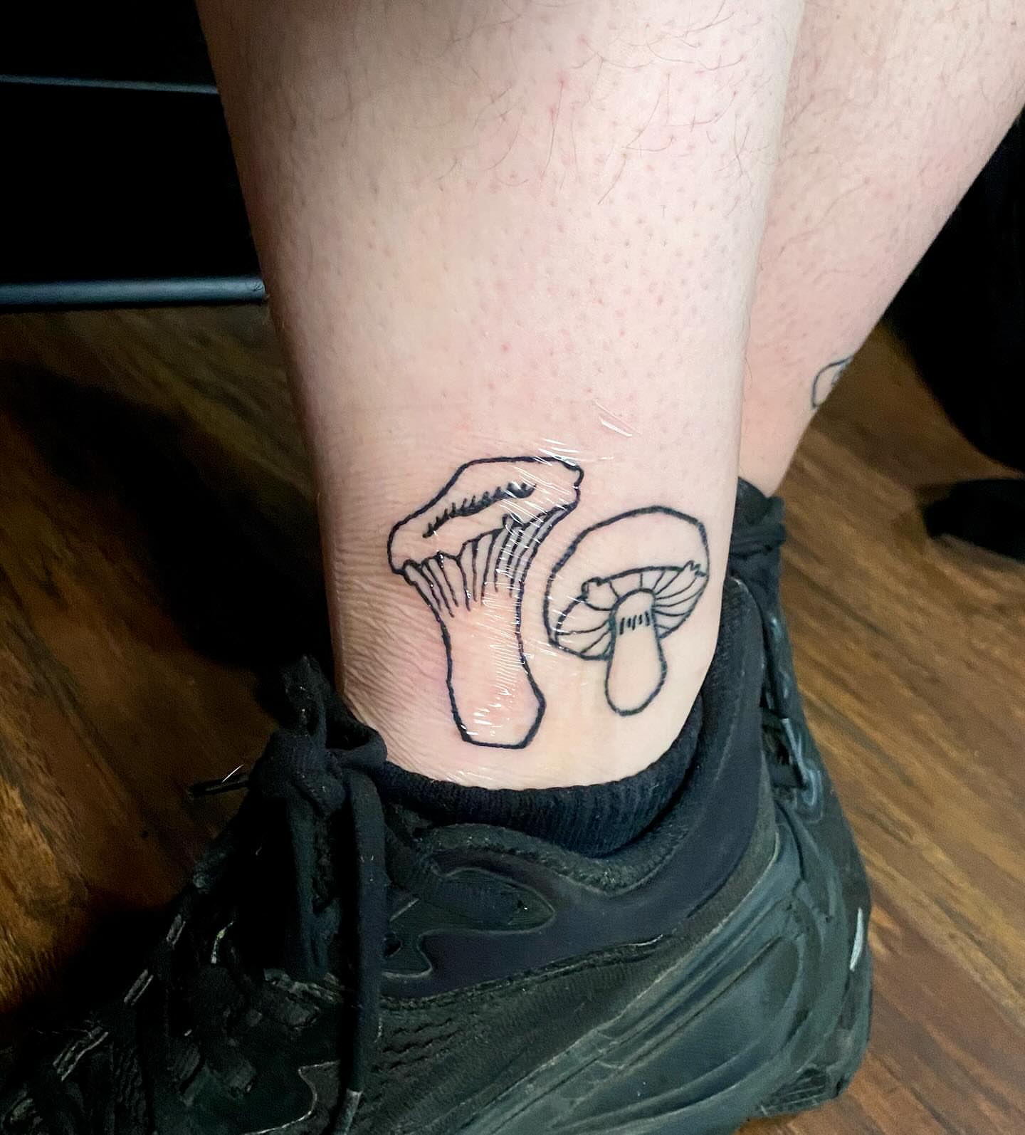 Mushroom black and grey tattoo on the calf by ollie, Portland, Oregon