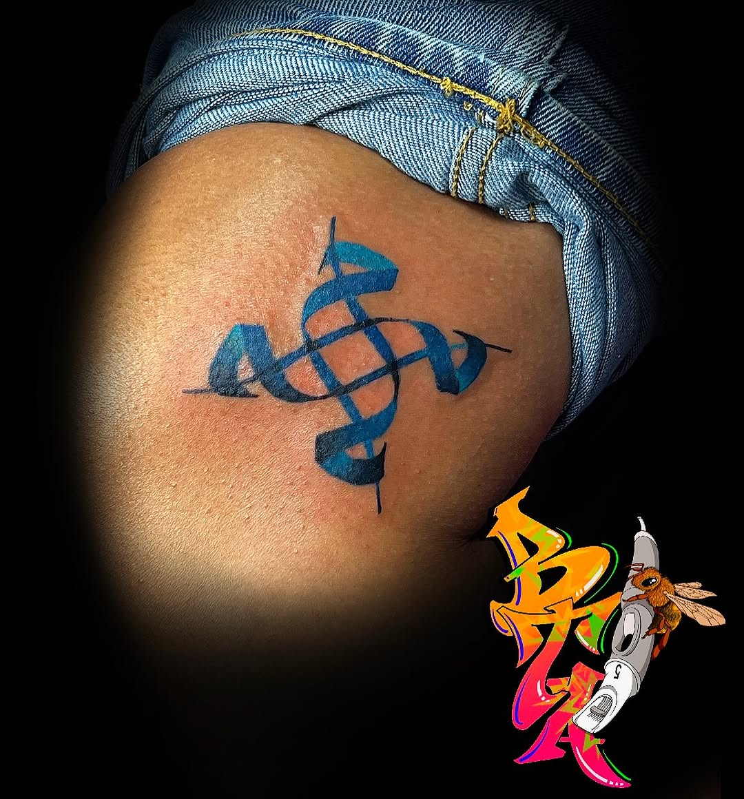 Abstract blue ribbon tattoo on the thigh by Blair The Artist!