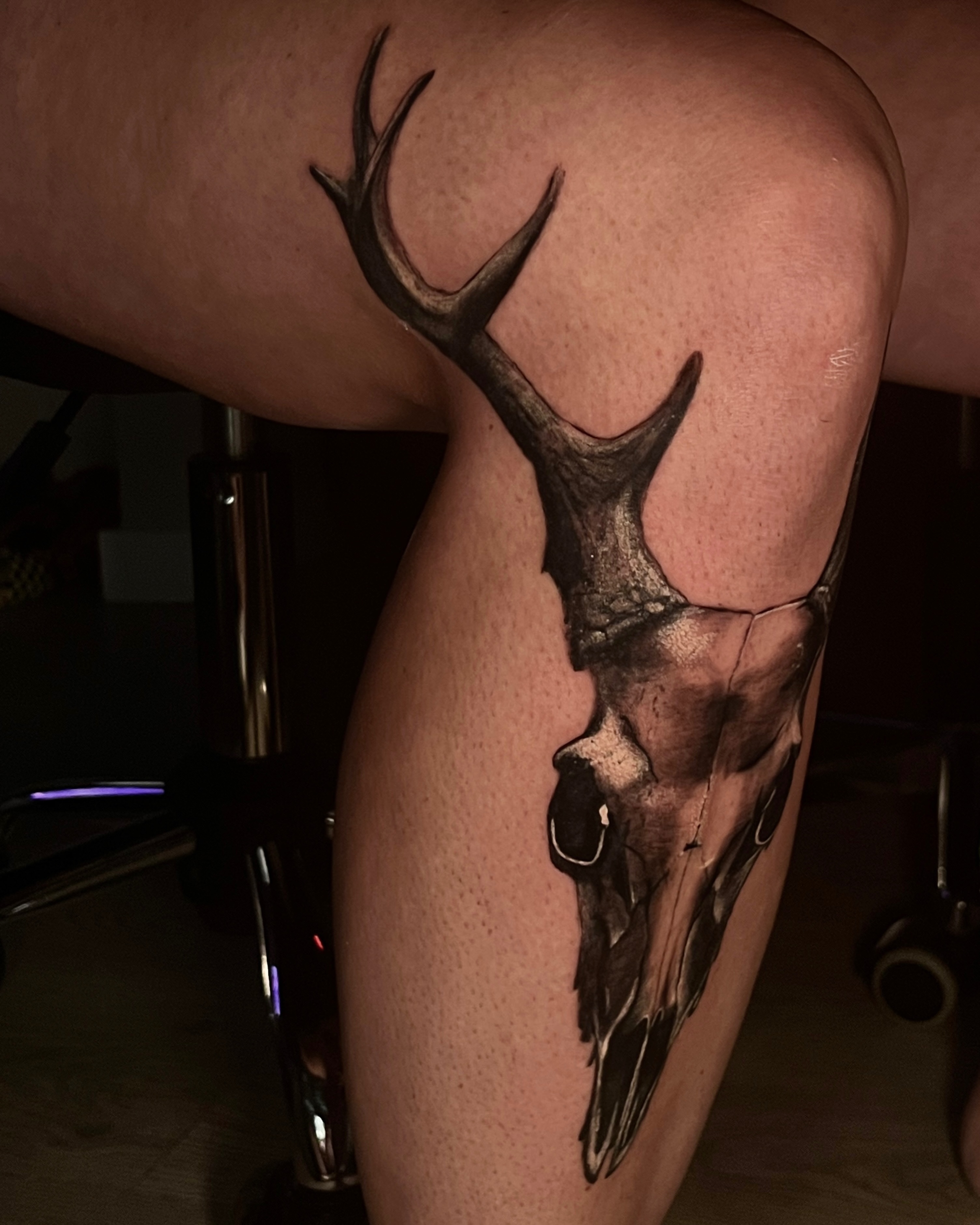 Deer skull realism tattoo on the thigh by Ryan Hindenach