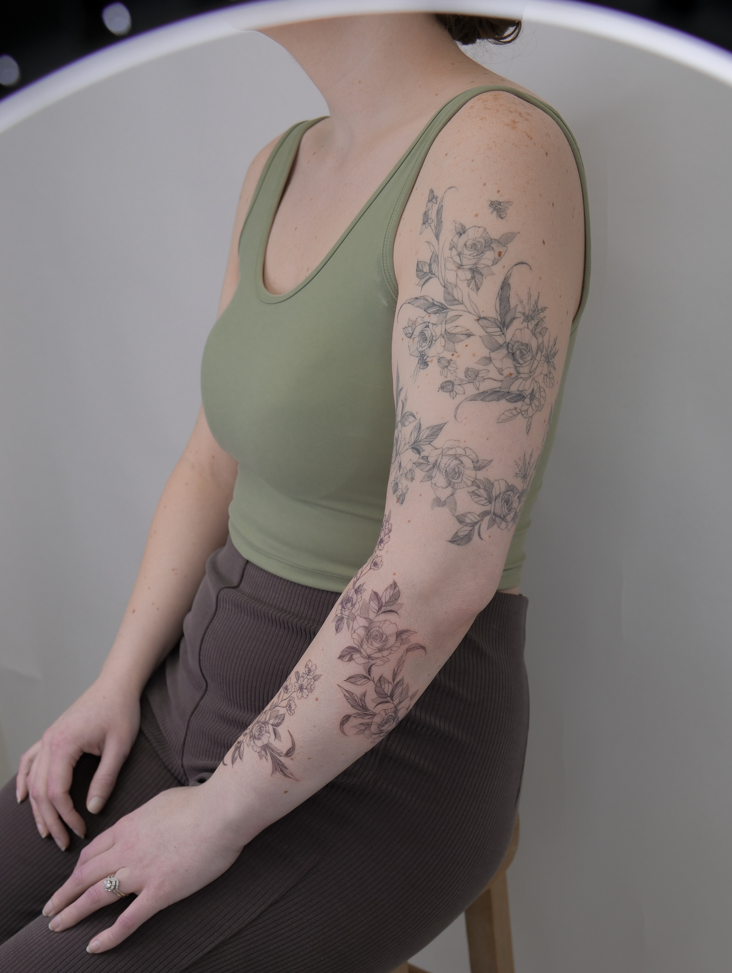 Floral bouquet black and grey tattoo on the upper arm by Tattoo in Charlotte NC, Charlotte, North Carolina