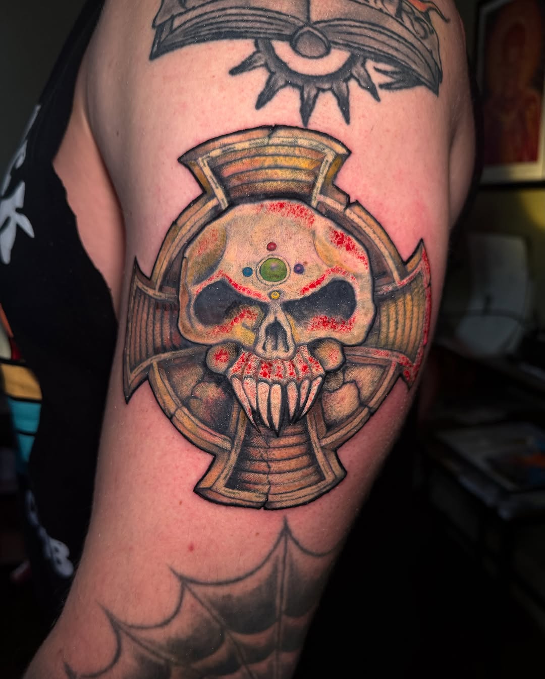 Skull with cross neo-traditional tattoo on the forearm by Brandt Norcross