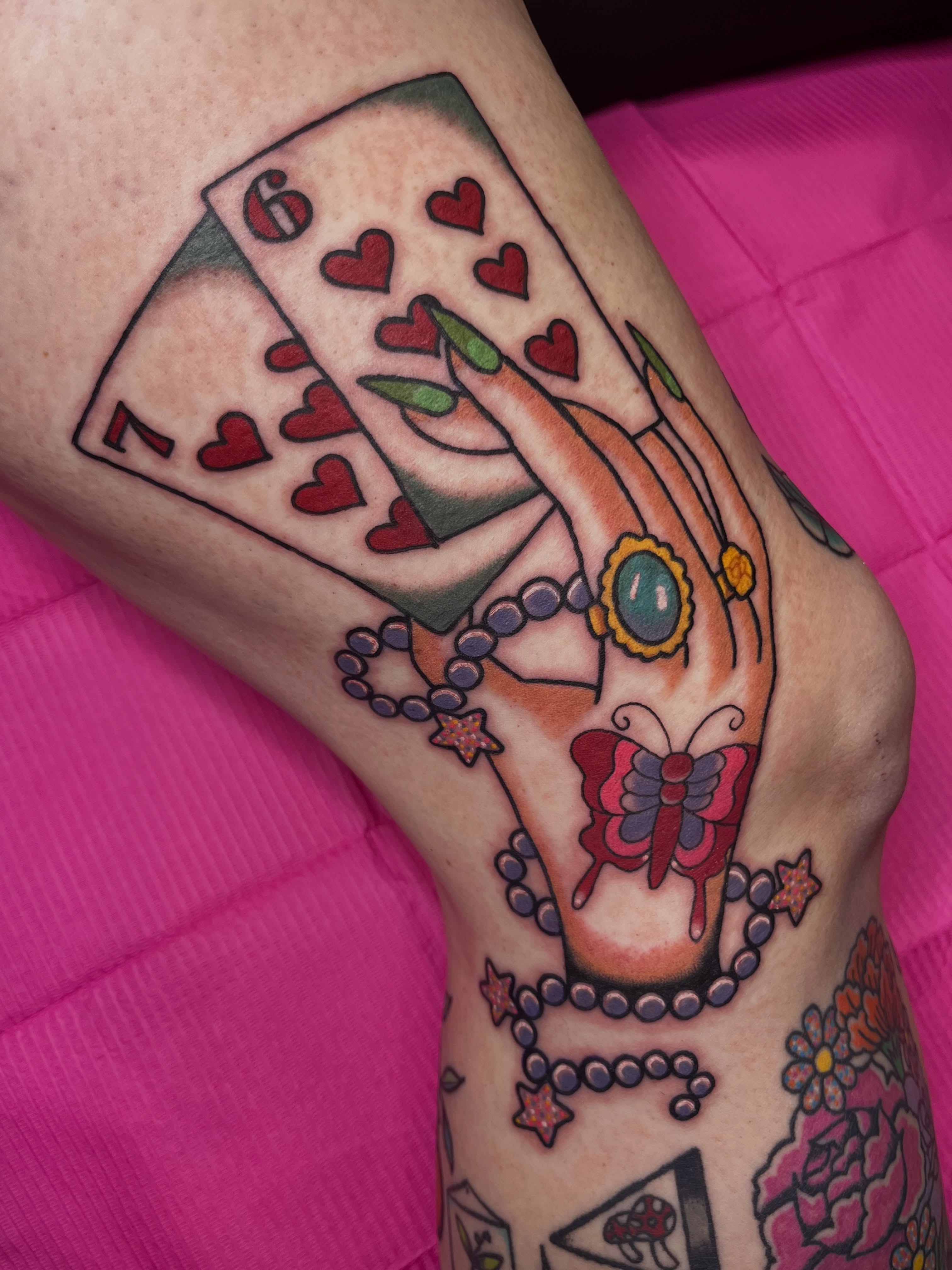 Playing cards and hand American traditional tattoo on the forearm by Cincinnati Tattoo Artist, Cincinnati