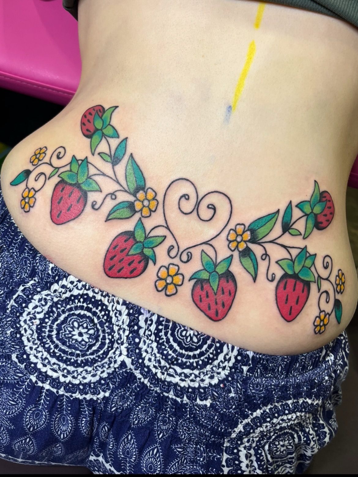 Strawberries and flowers new school tattoo on the torso by Cincinnati Tattoo Artist, Cincinnati