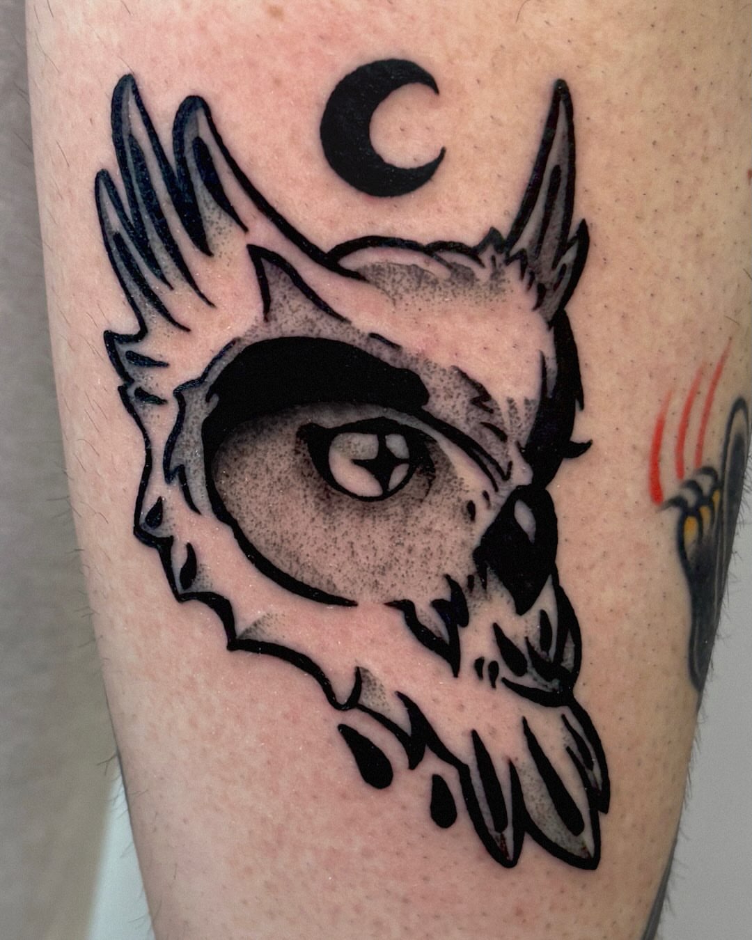 Owl black and grey tattoo on the forearm by Kal