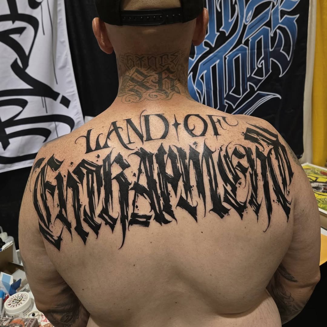 Tattoo by @diaztattoos โ lettering_script, blackwork