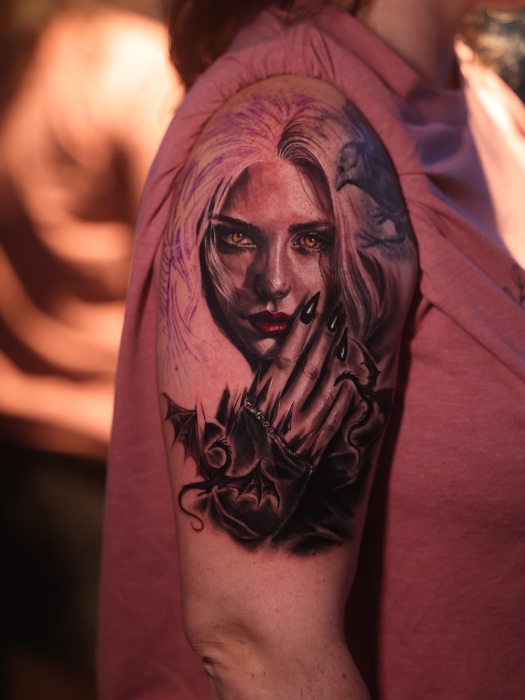 Woman with long hair realism tattoo on the upper arm by Brandon Sontag
