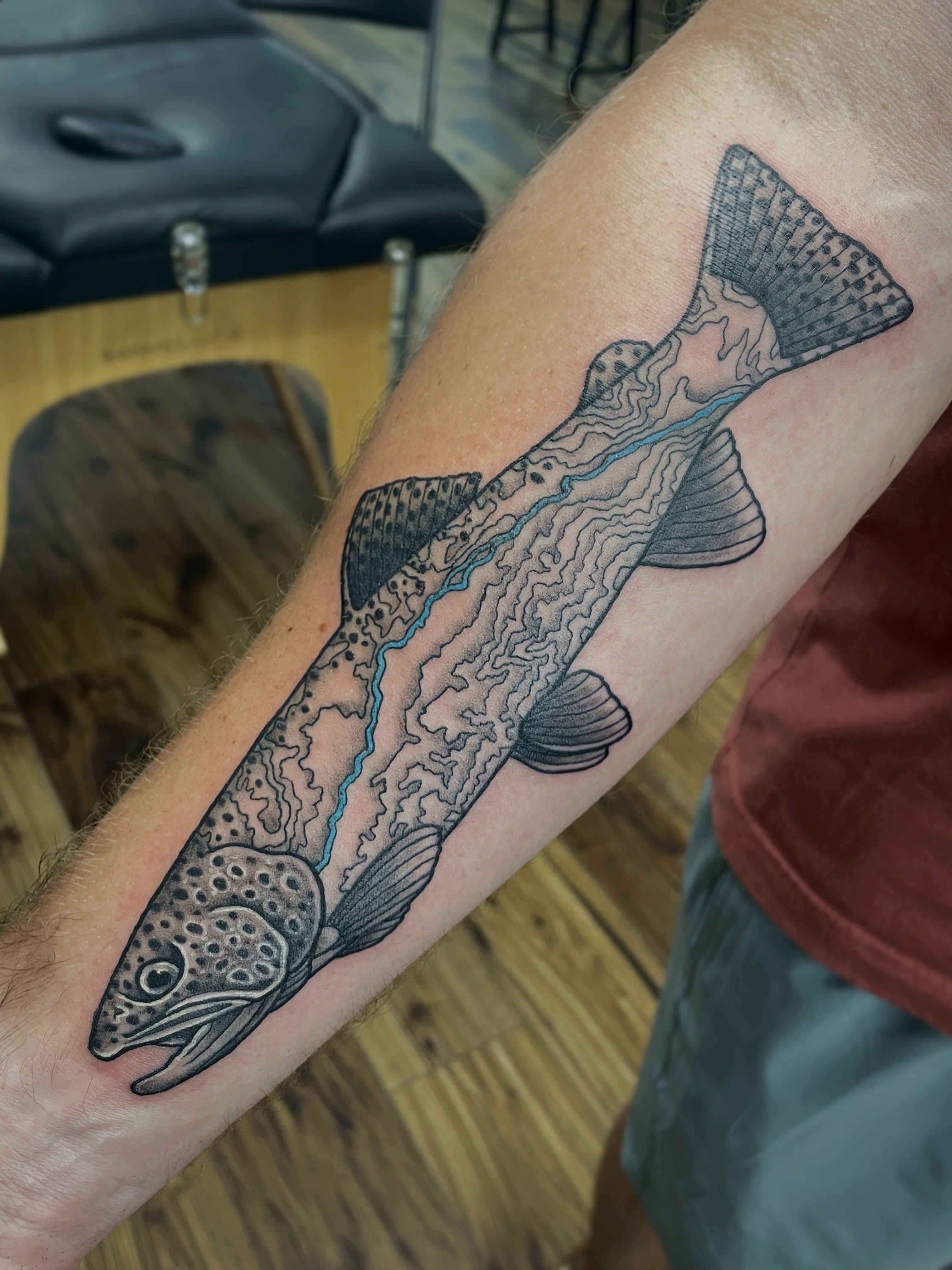 Trout black and grey tattoo on the forearm by πΌπ
ππΎπππππ