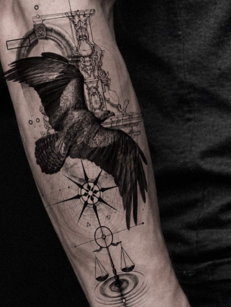 Eagle, compass, and scales of justice realism tattoo on the forearm by Seraph Geometry