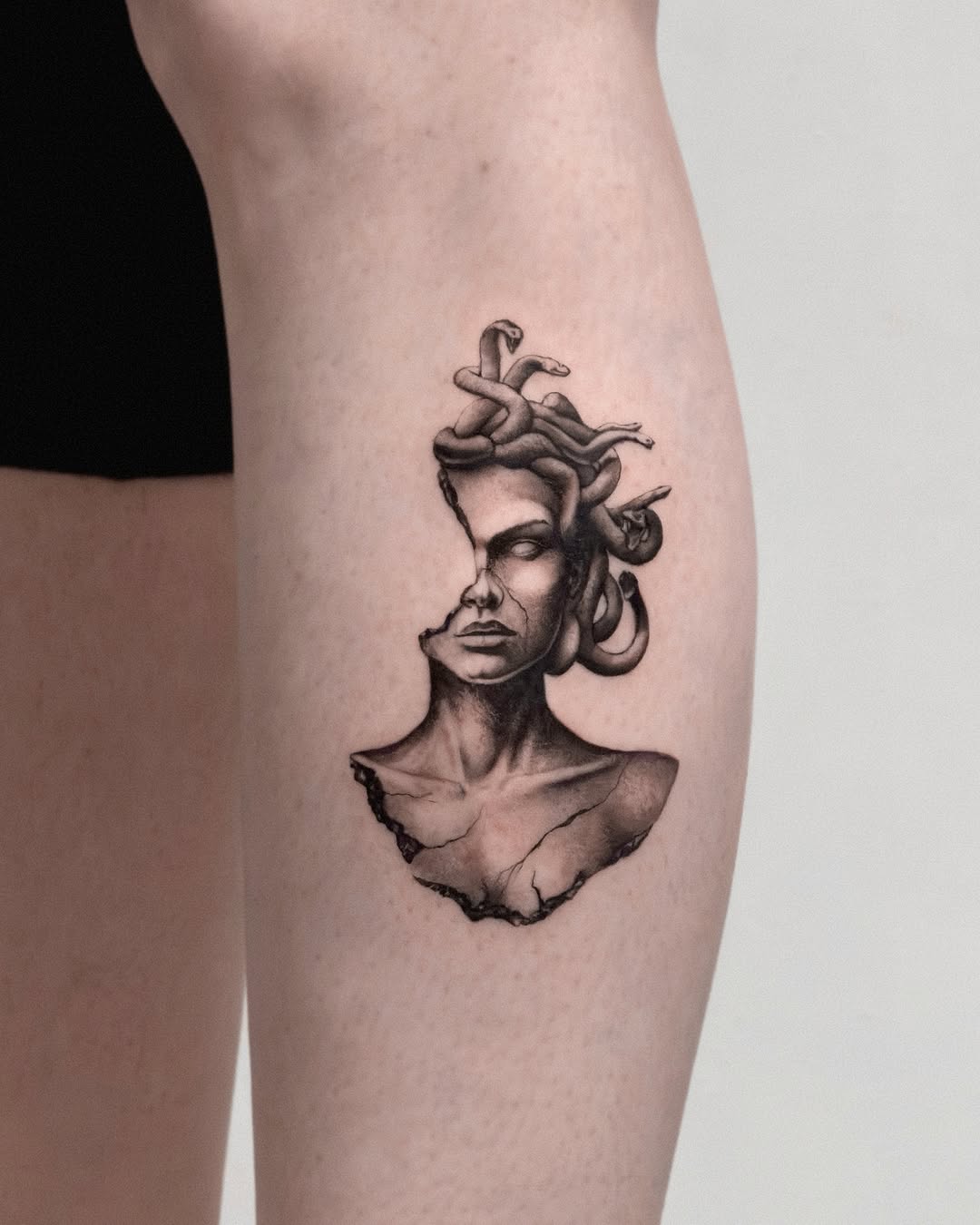 Tattoo by @henkotattooart — realism, black_and_grey