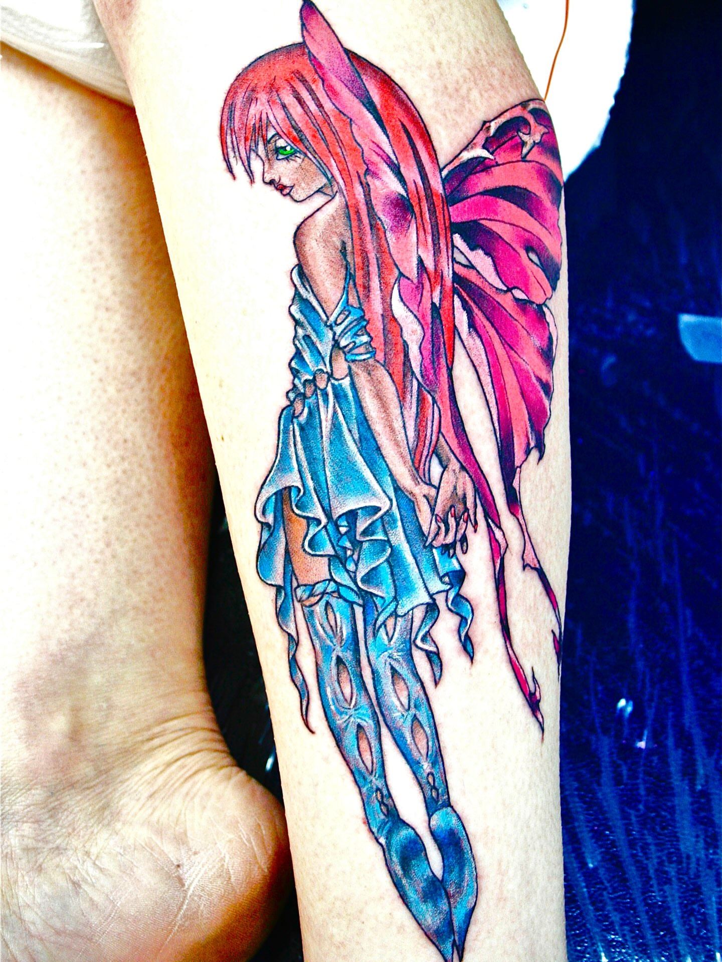 Fairy anime tattoo on the forearm by El Kapitan