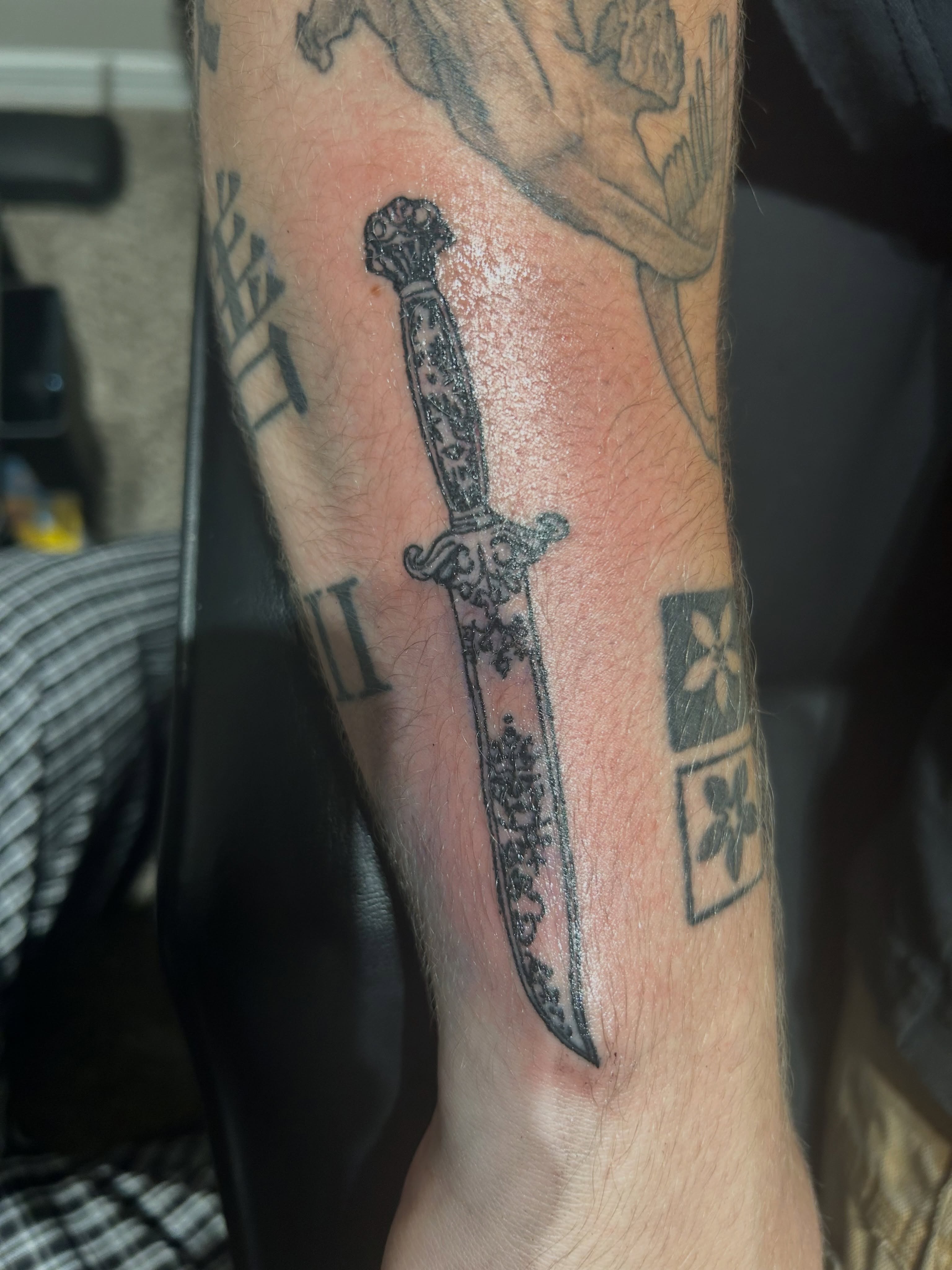 Sword black and grey tattoo on the forearm by @tatzbythadon