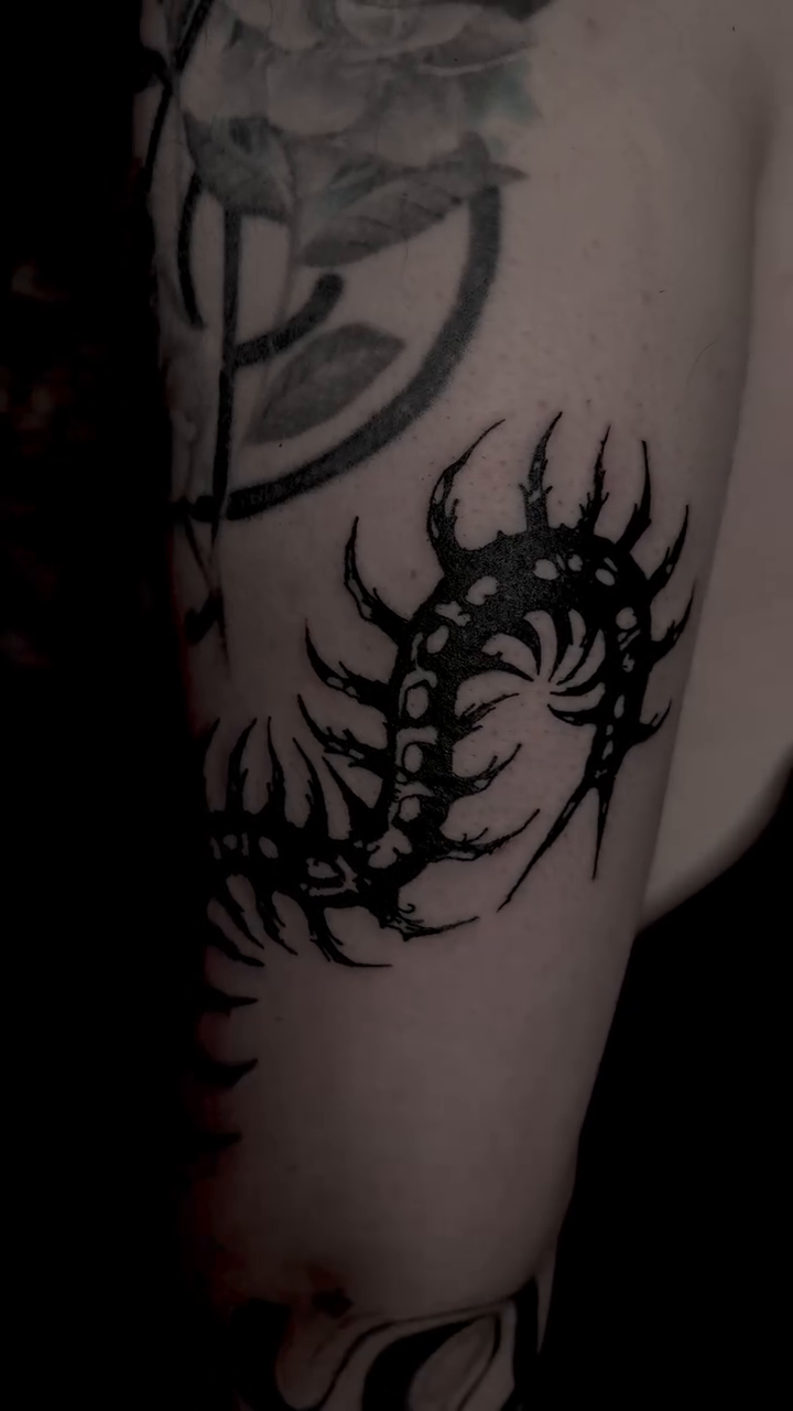 Centipede cyber sigilism tattoo on the forearm by Jordan Sandoval