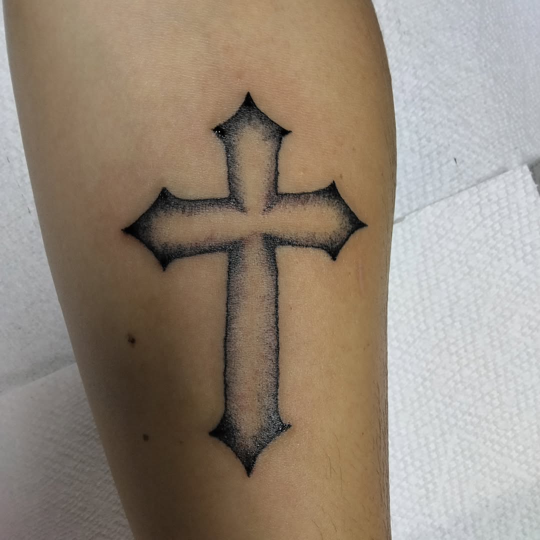 Cross tribal tattoo on the forearm by Malynda