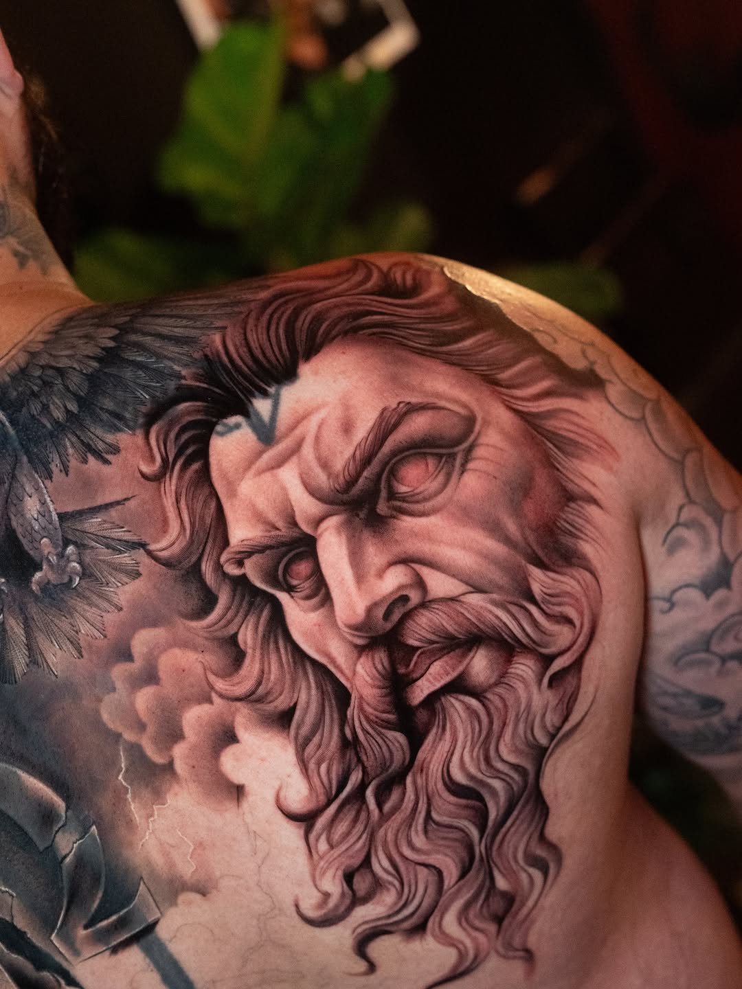 Zeus portrait realism tattoo on the chest by Franz Muñoz
