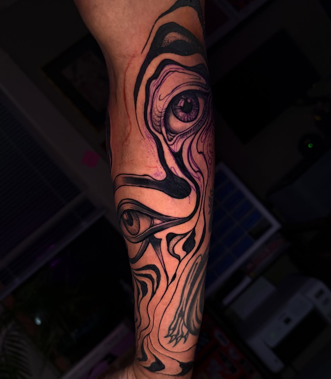 Eye surrealism tattoo on the forearm by Brandt Norcross