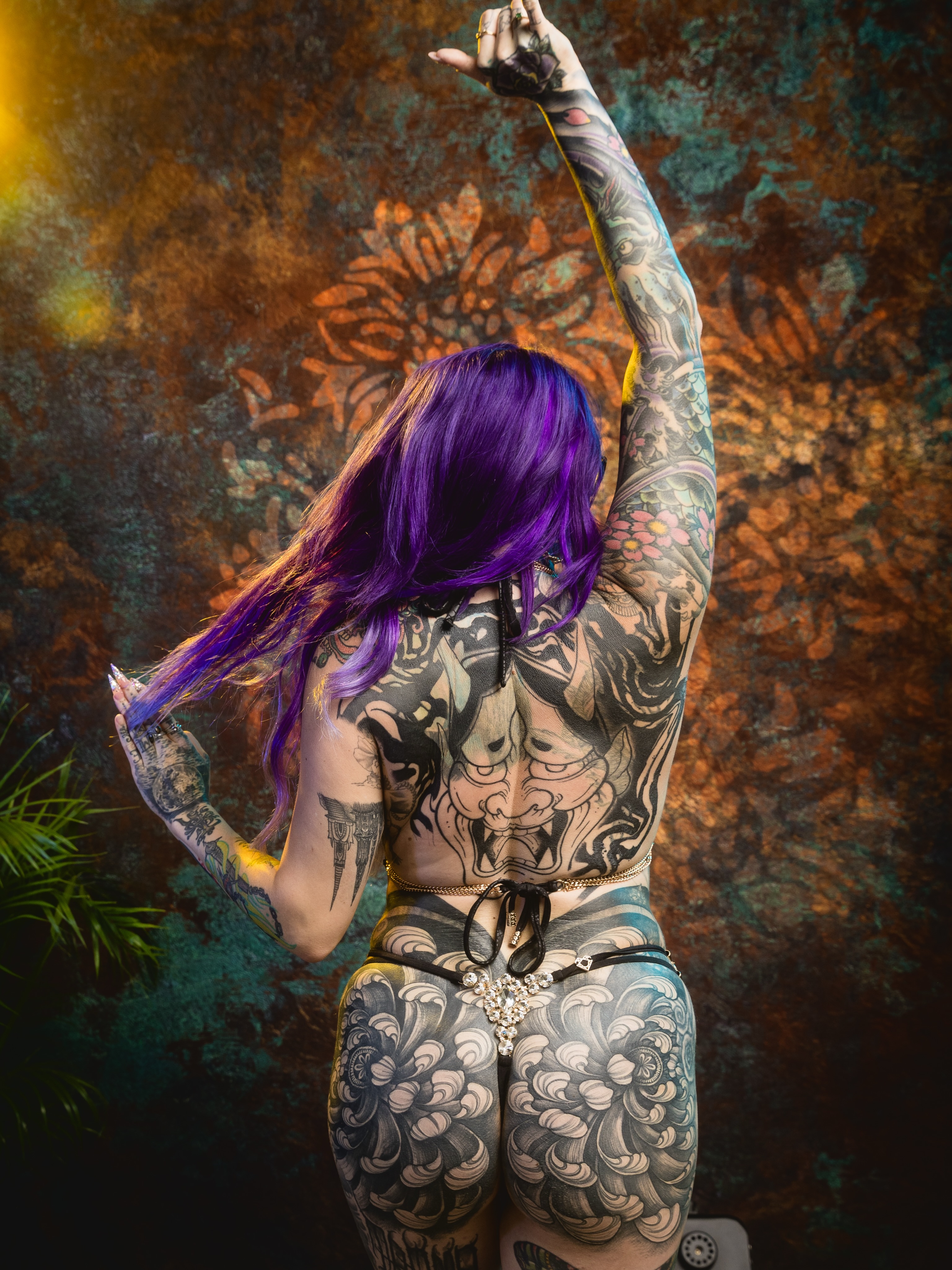 Tattooed woman American traditional tattoo on the torso by Kirsten Cameron