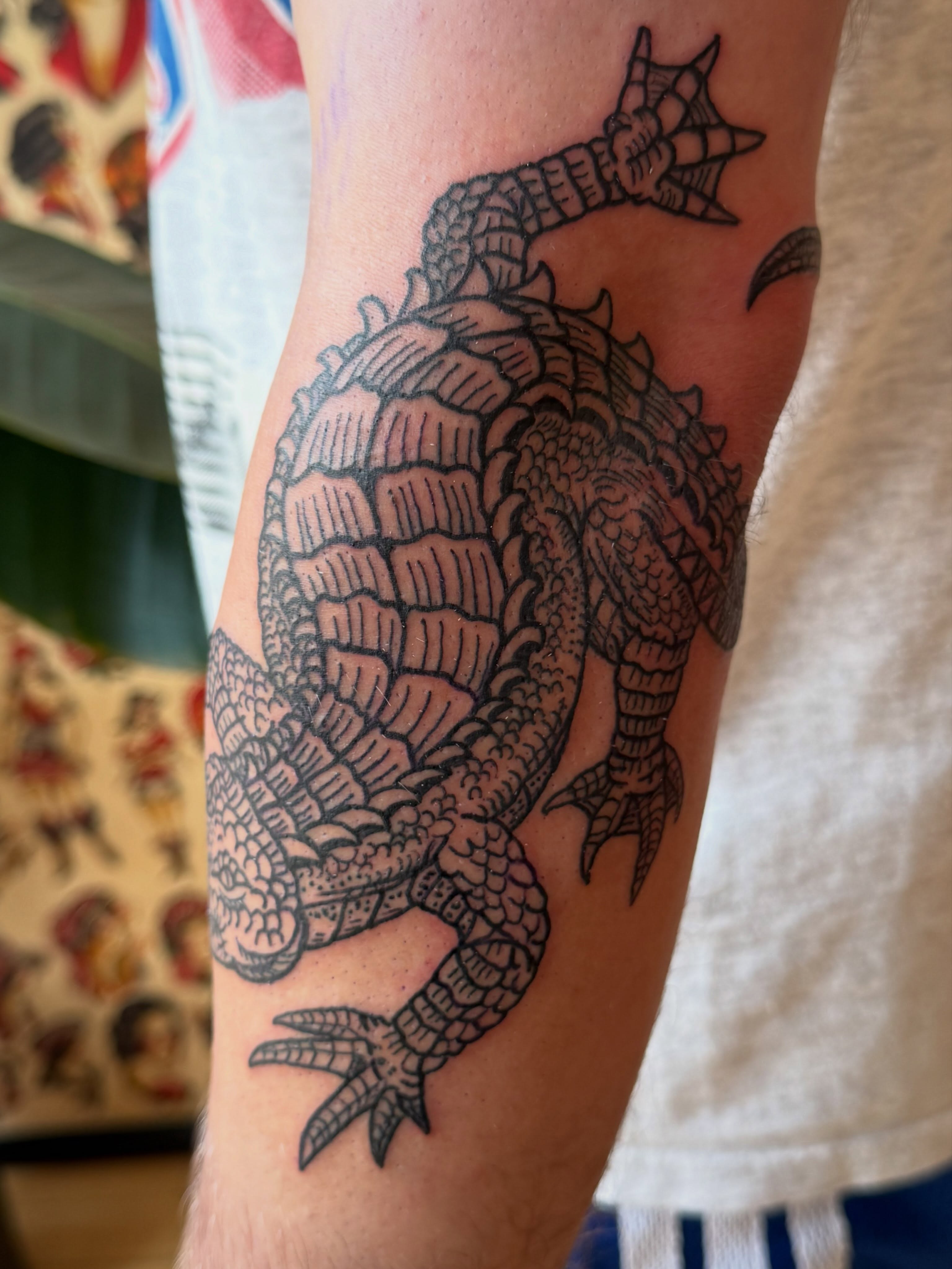 Serpent black and grey tattoo on the forearm by Eric Guntor, Philadelphia, Pennsylvania