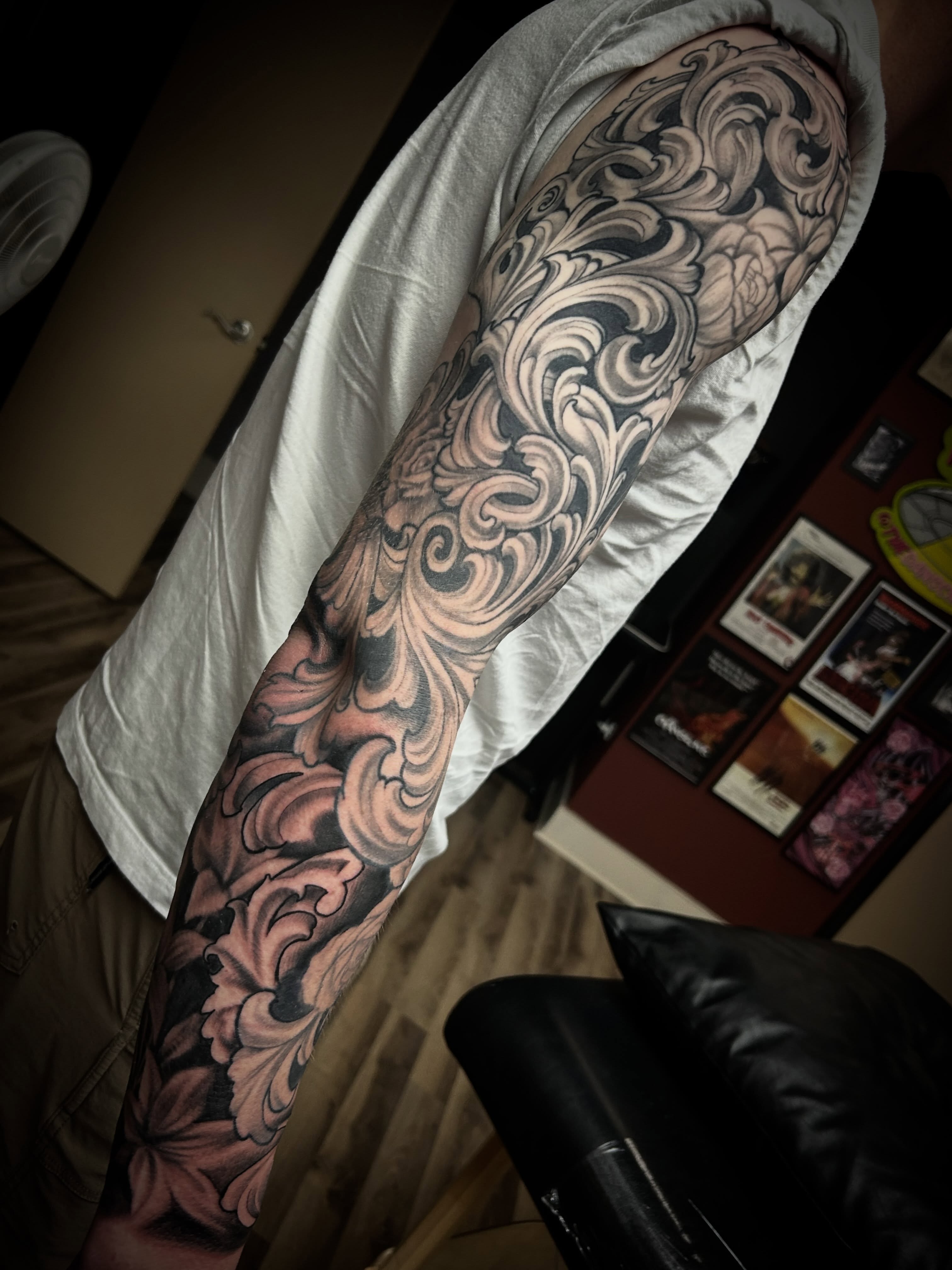 Scrollwork ornamental tattoo on the forearm by Dan Schuster