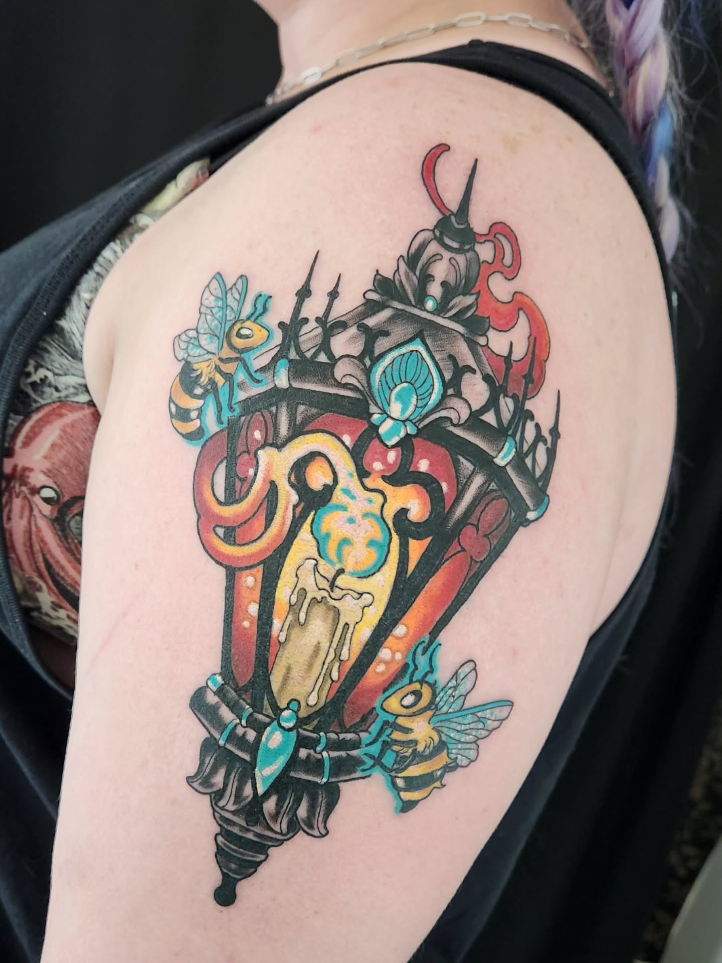 Candle and bee American traditional tattoo on the shoulder by Randy