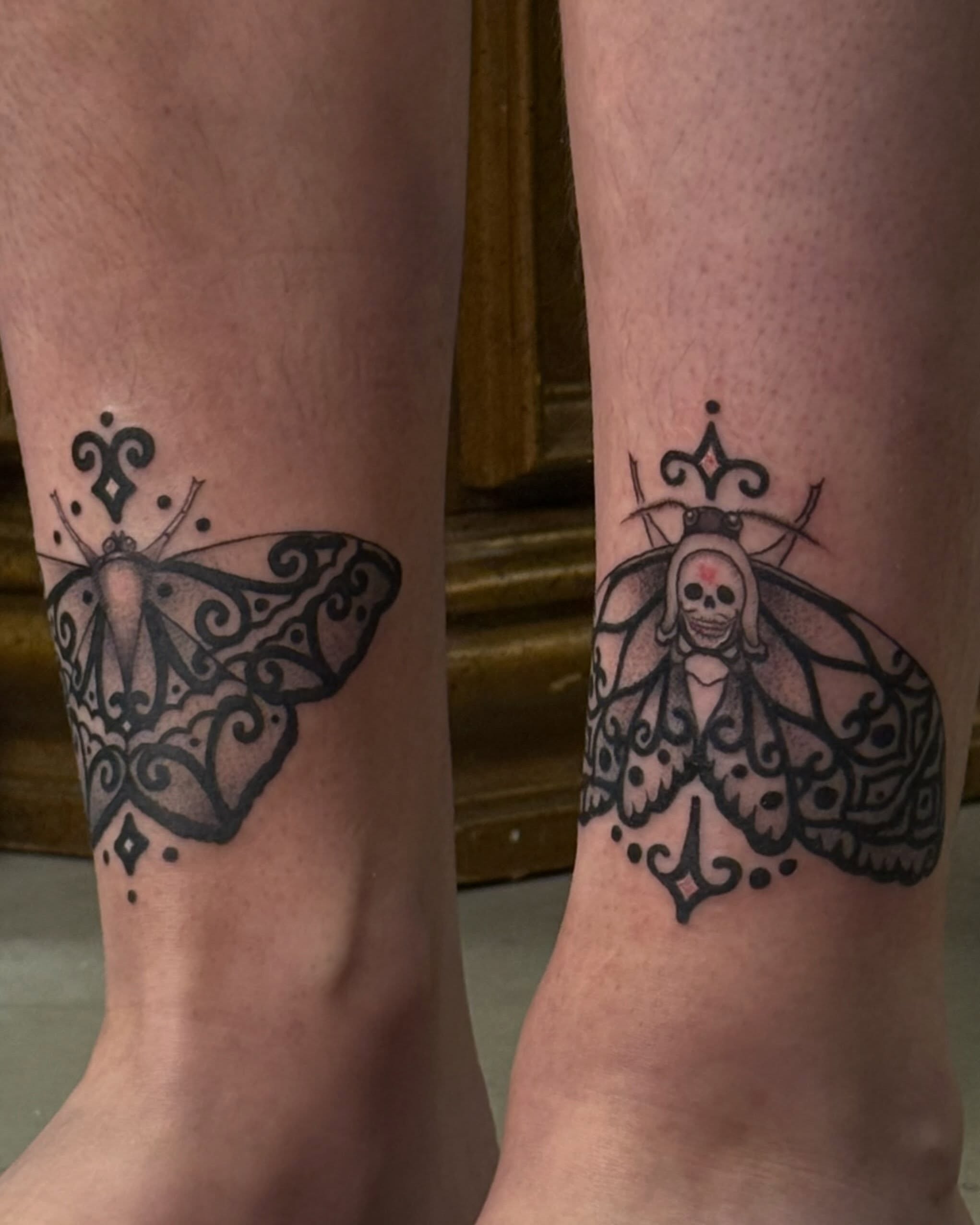 Moth black and grey tattoo on the foot by Christian