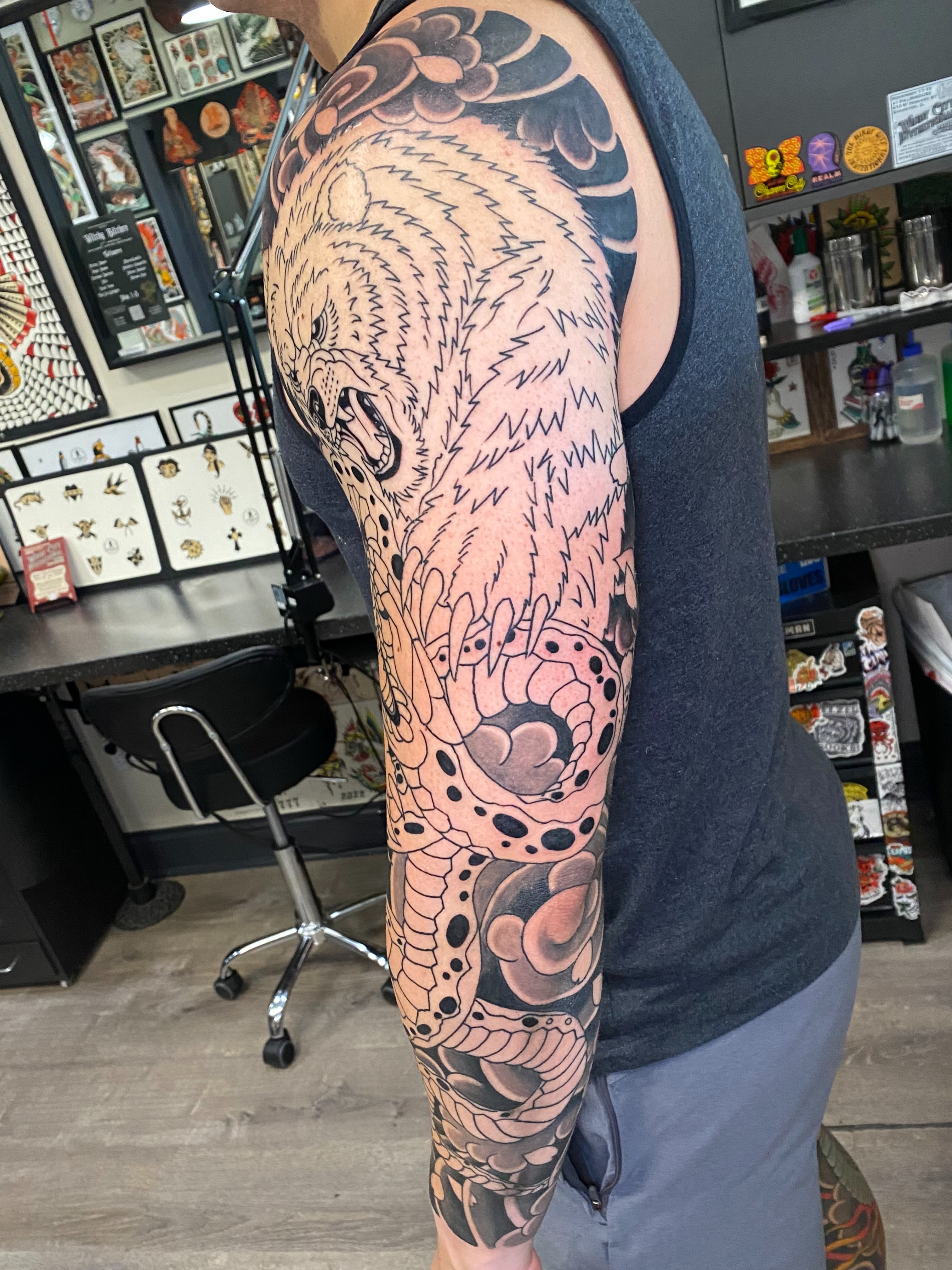 Tattoo by @dminus12 — dotwork, realism