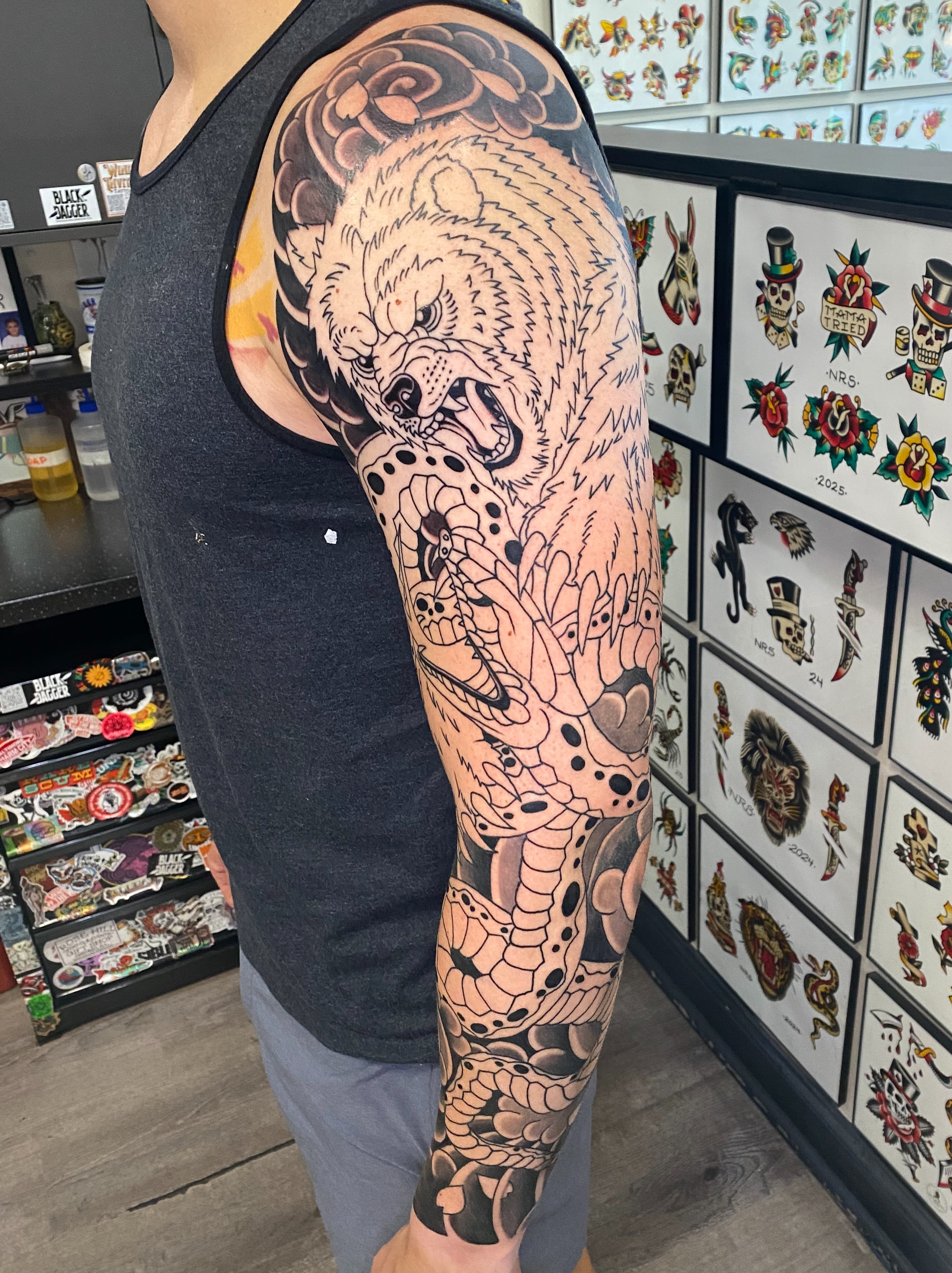Tattoo by @dminus12 — american_traditional, dotwork