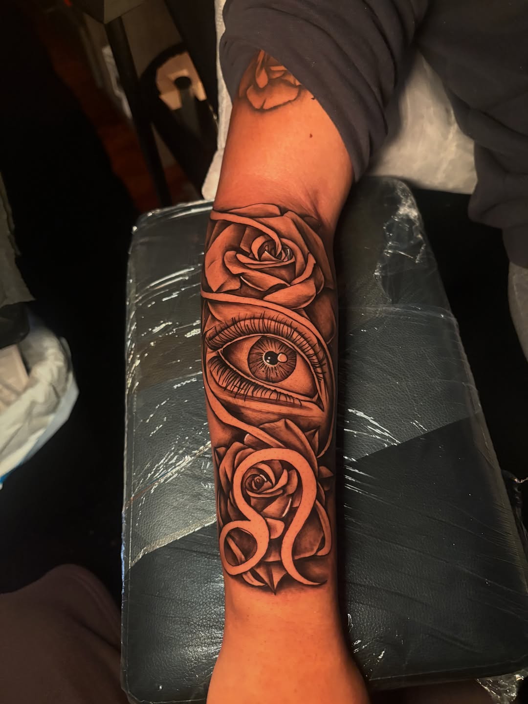 Tattoo by @maleekinkz โ realism, black_and_grey