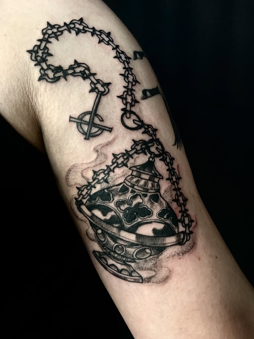 Incense burner with chain and symbol dark art tattoo on the forearm by Nashville Tattoo Artist