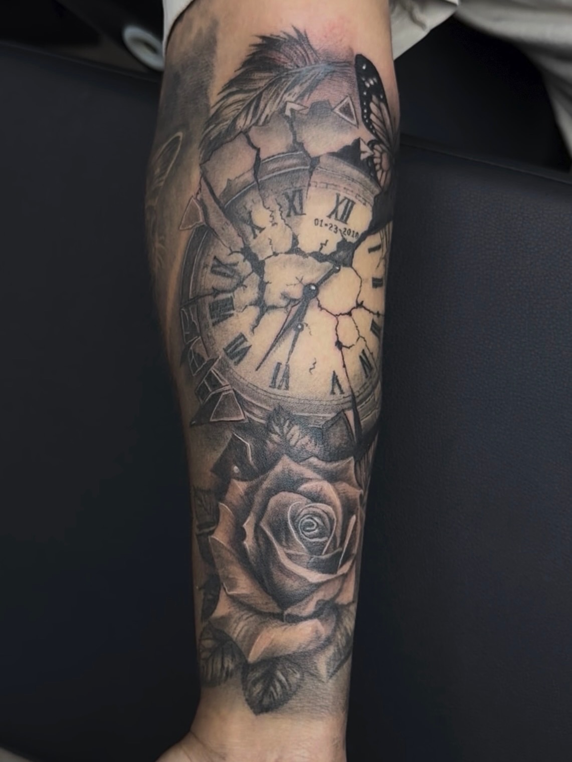Clock and rose realism tattoo on the forearm by 🐺