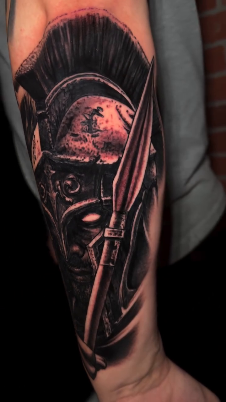 Spartan warrior helmet and lion realism tattoo by Raul Ugarte, Roseville, California
