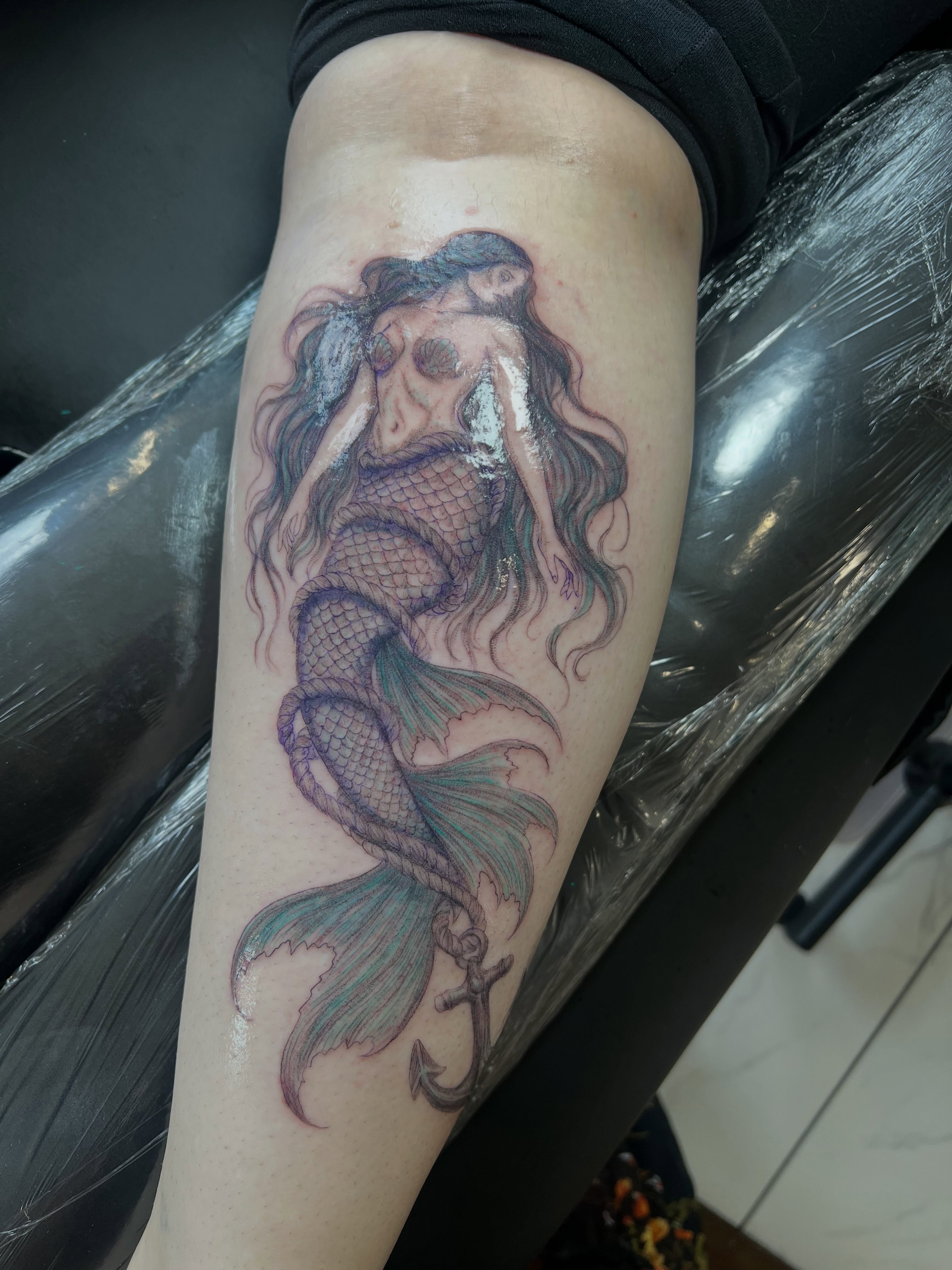 Mermaid realism tattoo on the thigh by Jordi WA Tacoma Tattooer