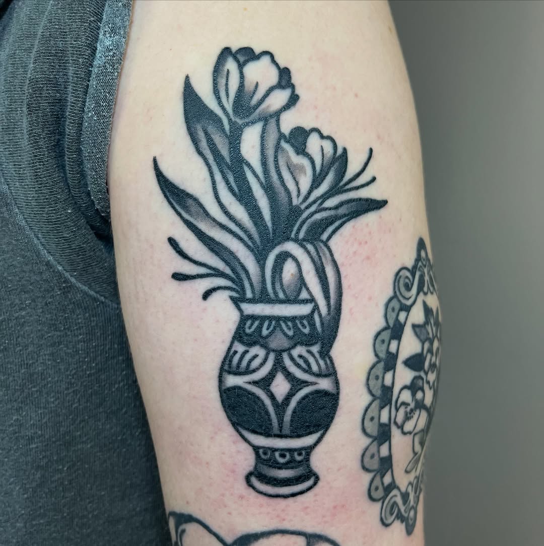 Tattoo by @hannah_ruddell — american_traditional, black_and_grey