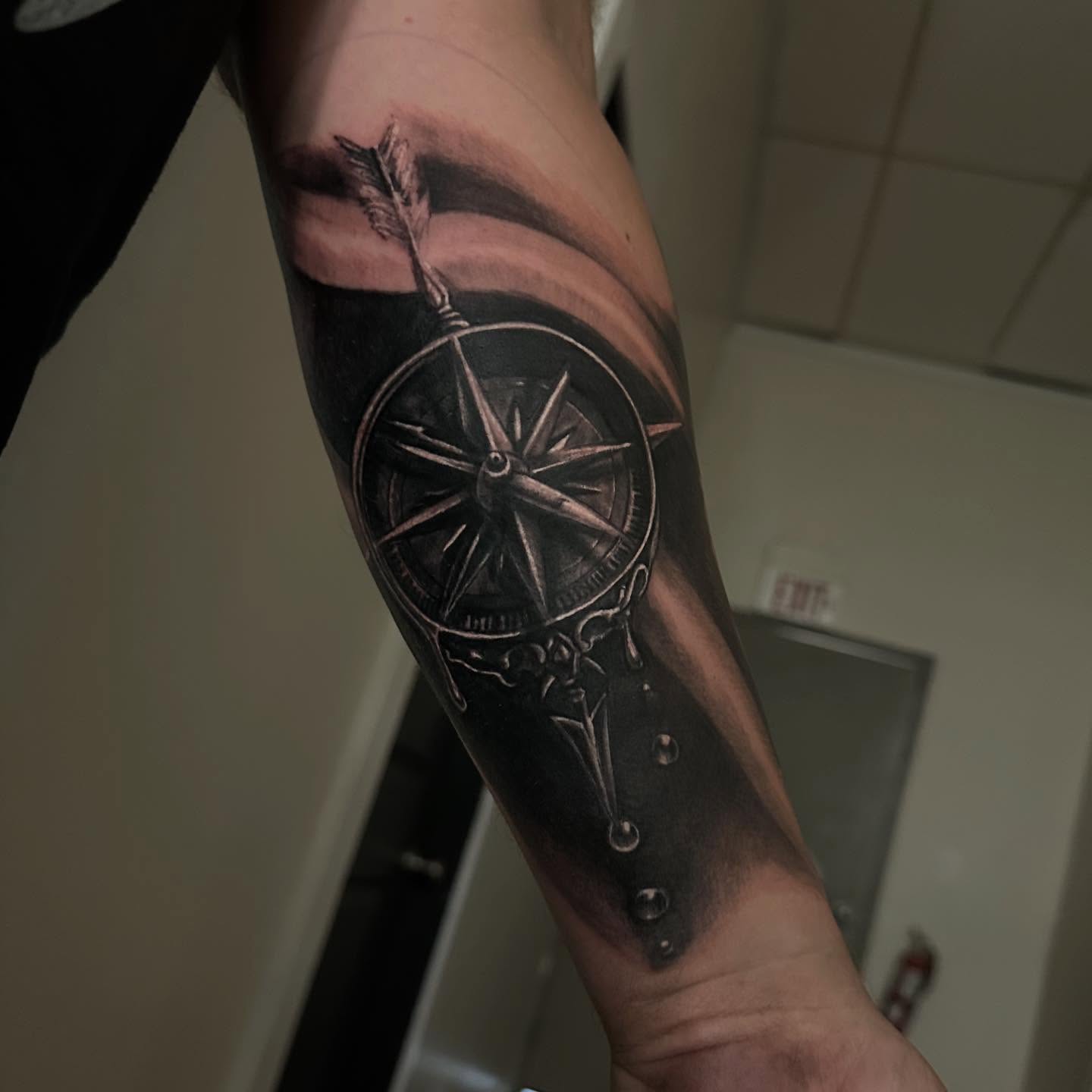 Compass realism tattoo on the forearm by Neil5one3