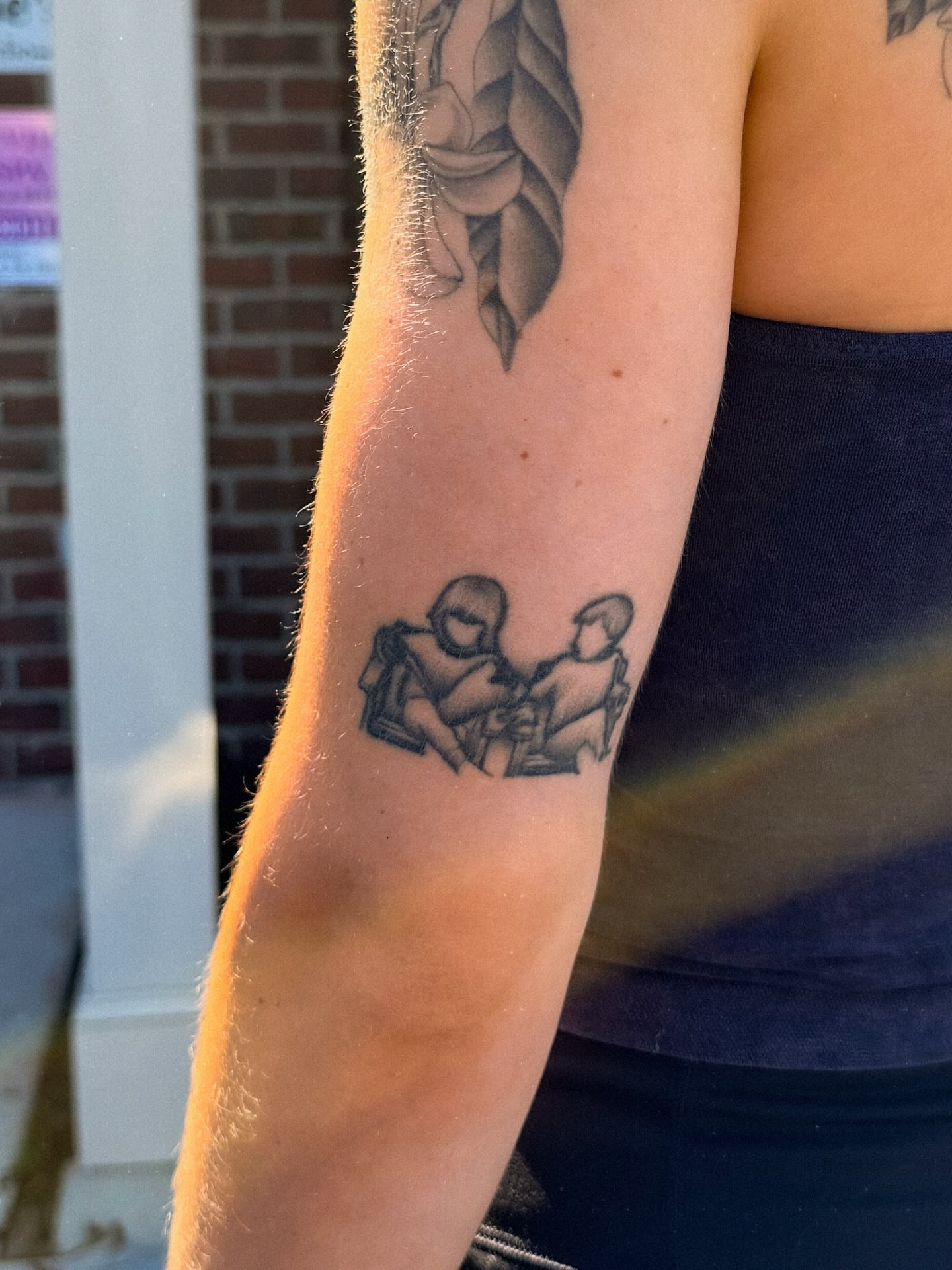 Two figures black and grey tattoo on the forearm by 𝔍𝔞𝔯𝔢𝔡 𝔞𝔩𝔩𝔢𝔫