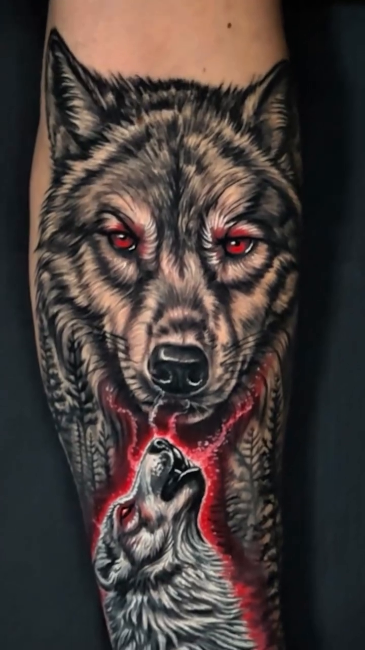 Wolves howling realism tattoo on the forearm by Omar Sheriff Herrera