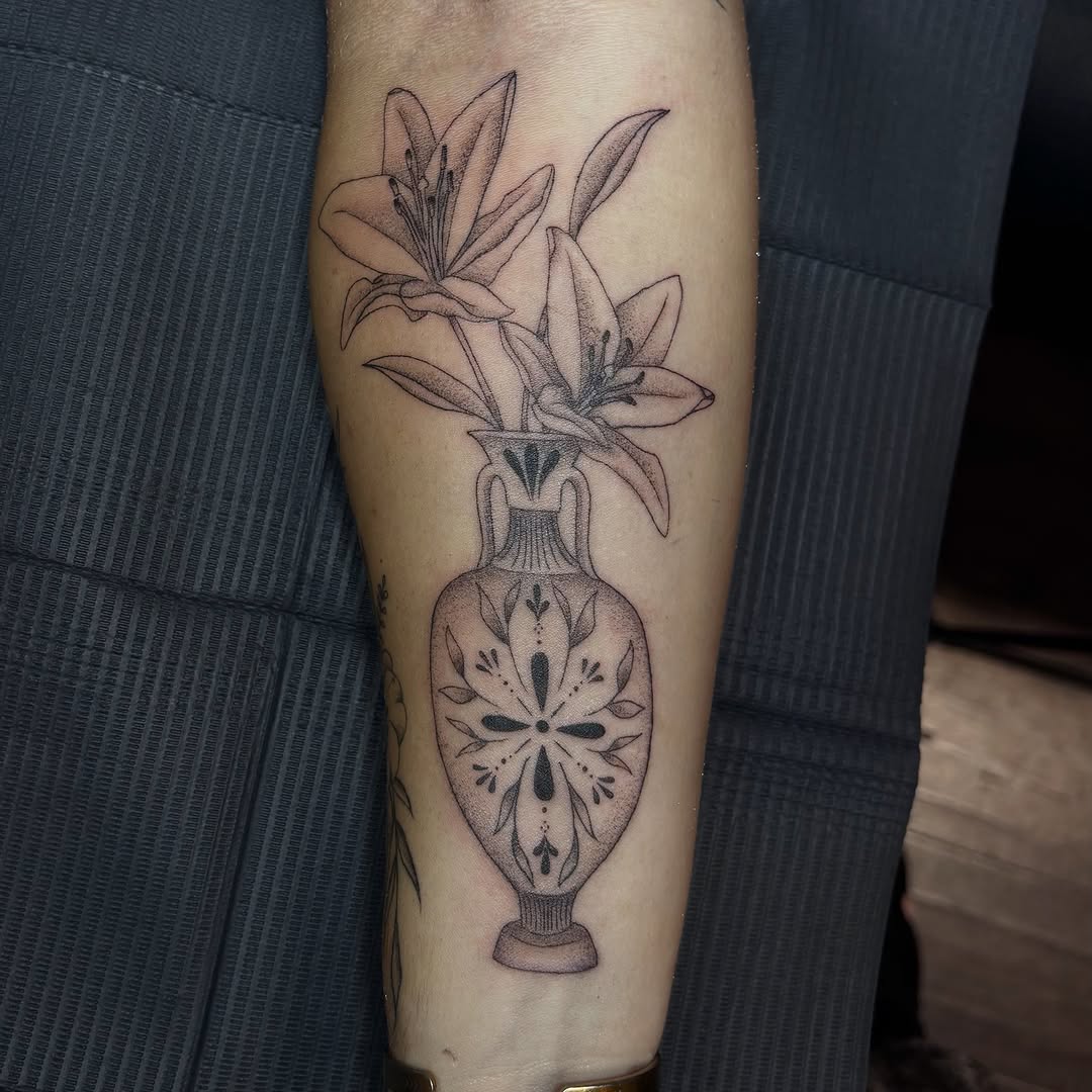 Vase with lilies fine line tattoo on the forearm by ππππππ