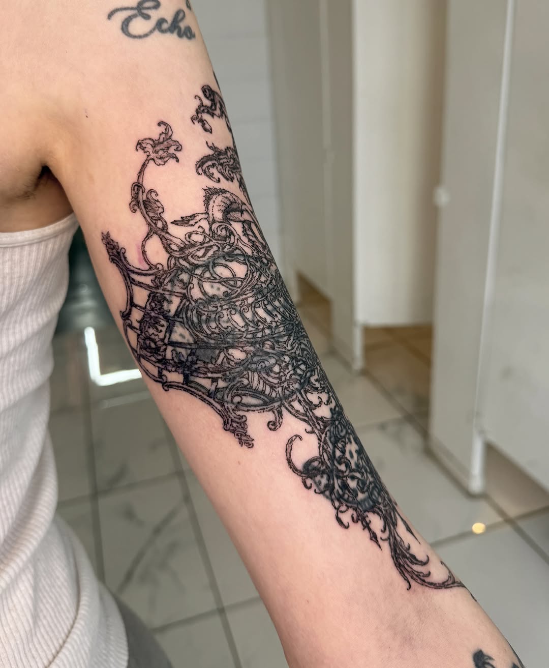 Ornate floral pattern ornamental tattoo on the forearm by Penelope