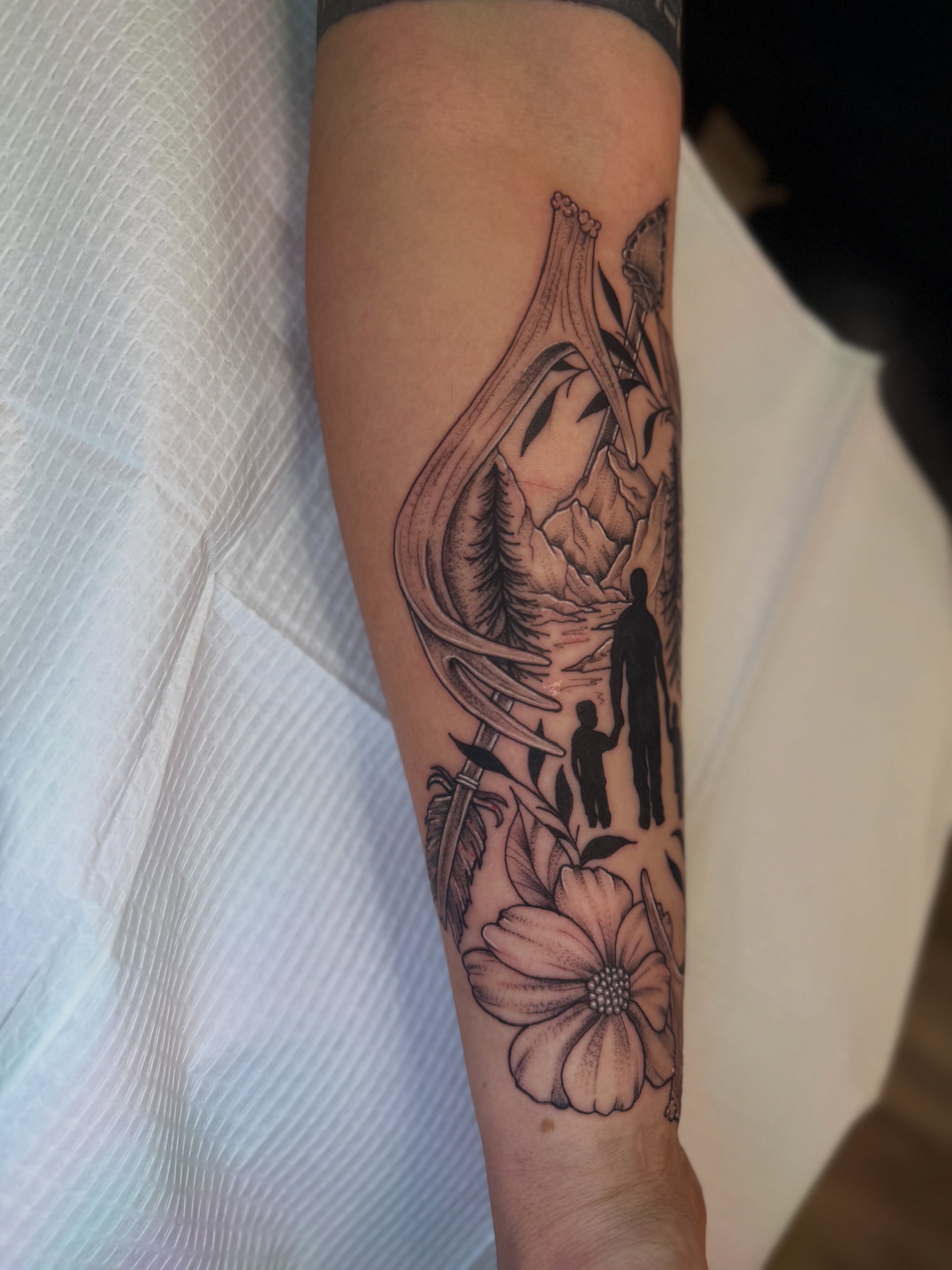 Family journey realism tattoo on the forearm by McKenna