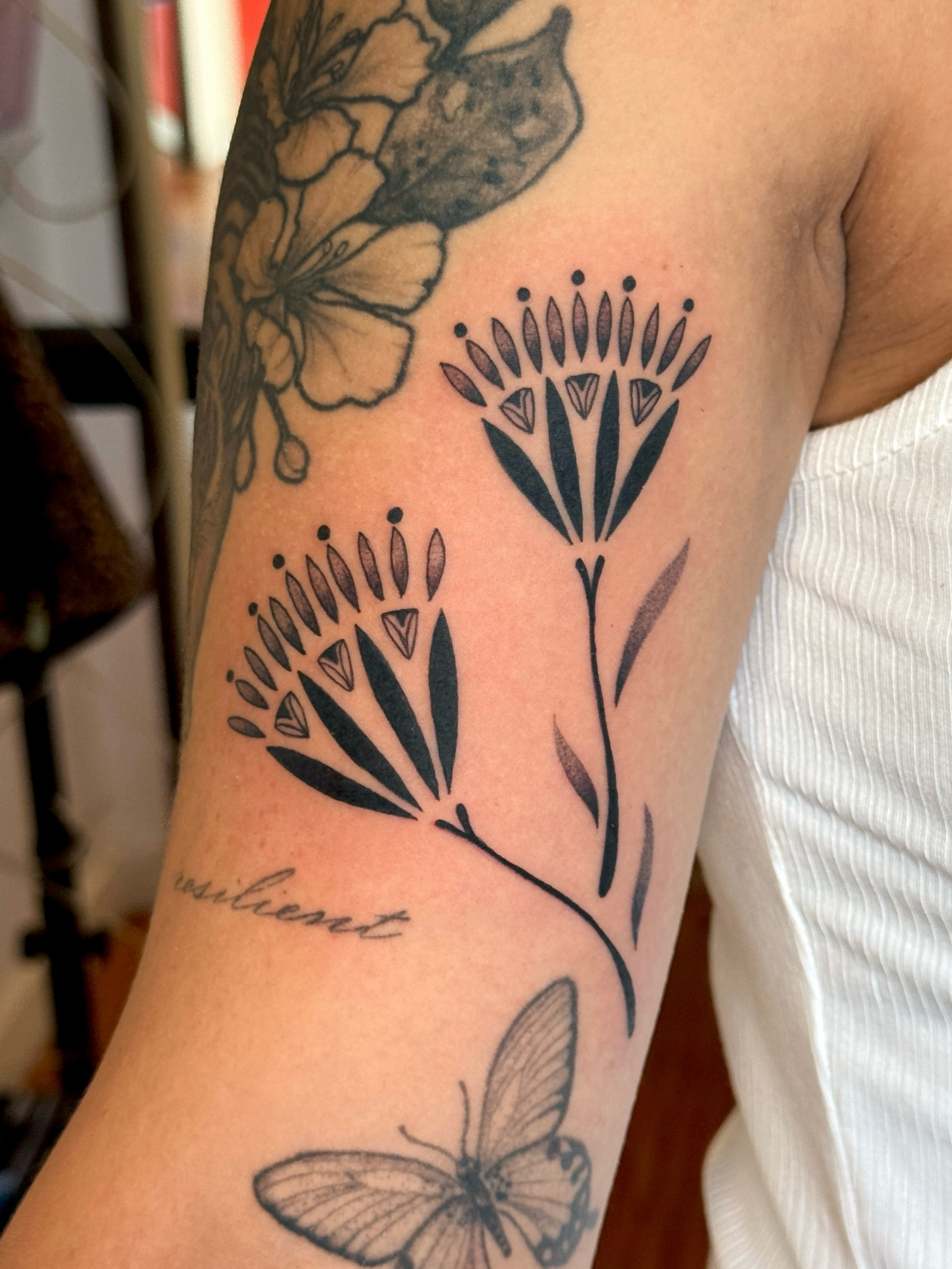 Floral arrangement black and grey tattoo on the forearm by tattoos by miss jackie o 🎱