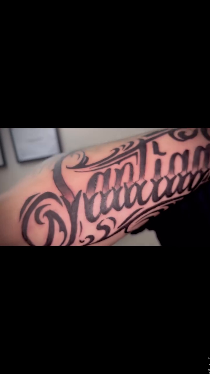Santiago script tattoo lettering tattoo on the forearm by Alejandro N Duran
