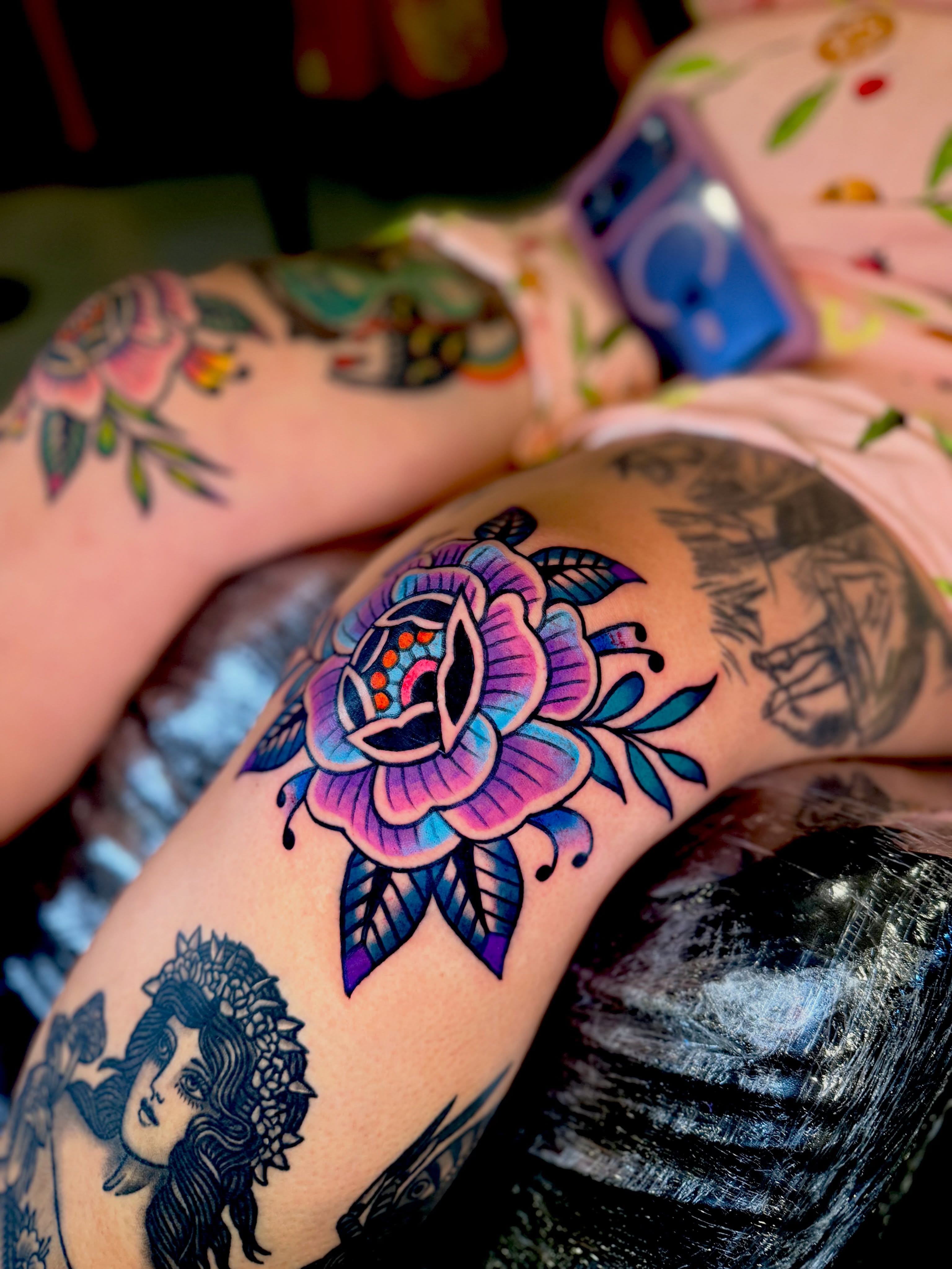 Flower American traditional tattoo on the thigh by Barbara Gonzalez