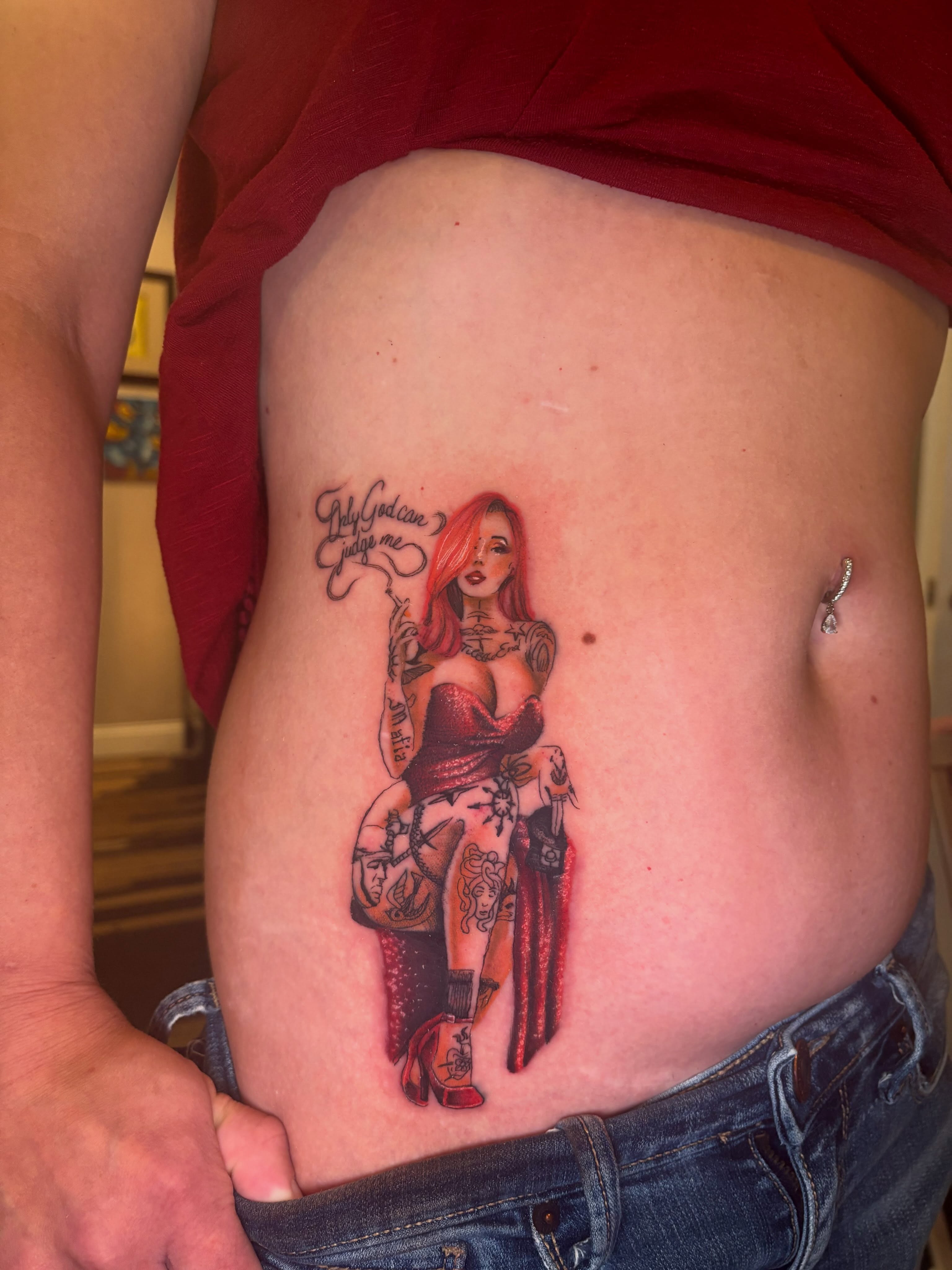 Pin-up girl American traditional tattoo on the ribs by Aubri Aunna