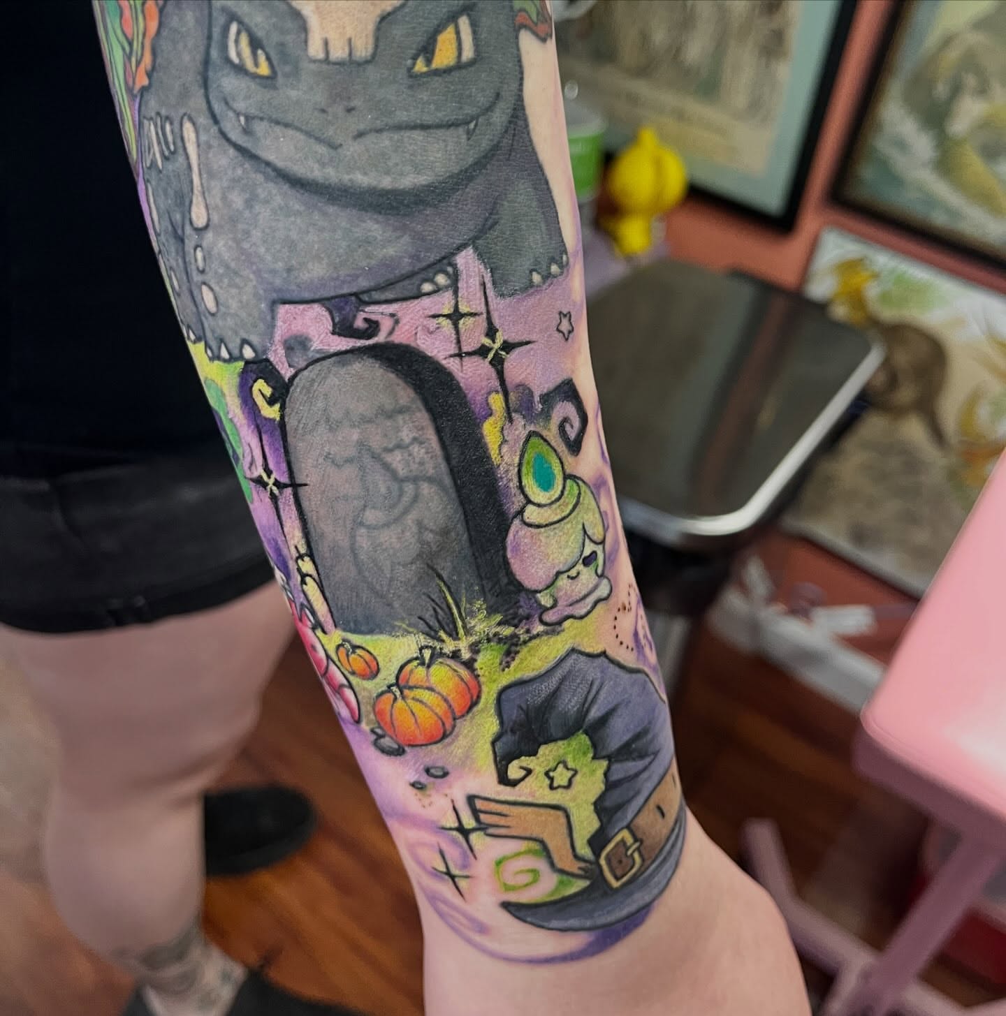 Haunted house and ghost dotwork tattoo on the forearm by Cami Rose