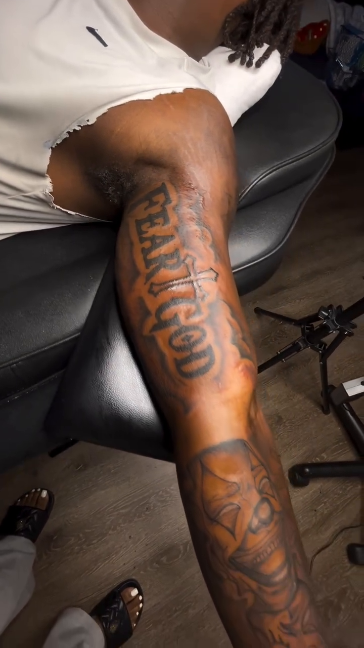 Fear God text and ornamental designs realism tattoo on the upper arm by Barbie Mari ๐
โญ๏ธ