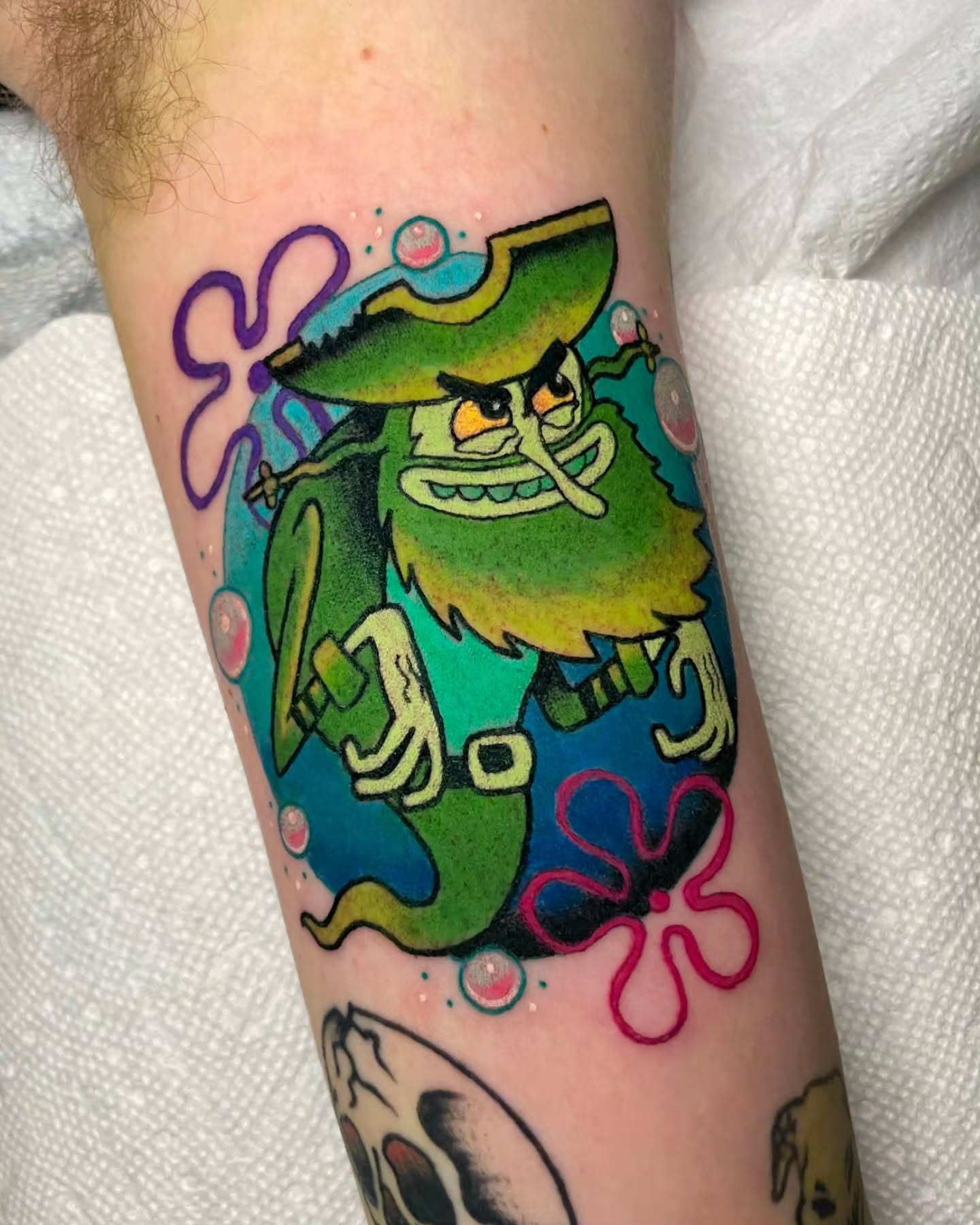 Pirate leprechaun new school tattoo on the forearm by 𝔎𝔦𝔯𝔞 𝔅𝔦𝔰𝔥𝔬𝔭