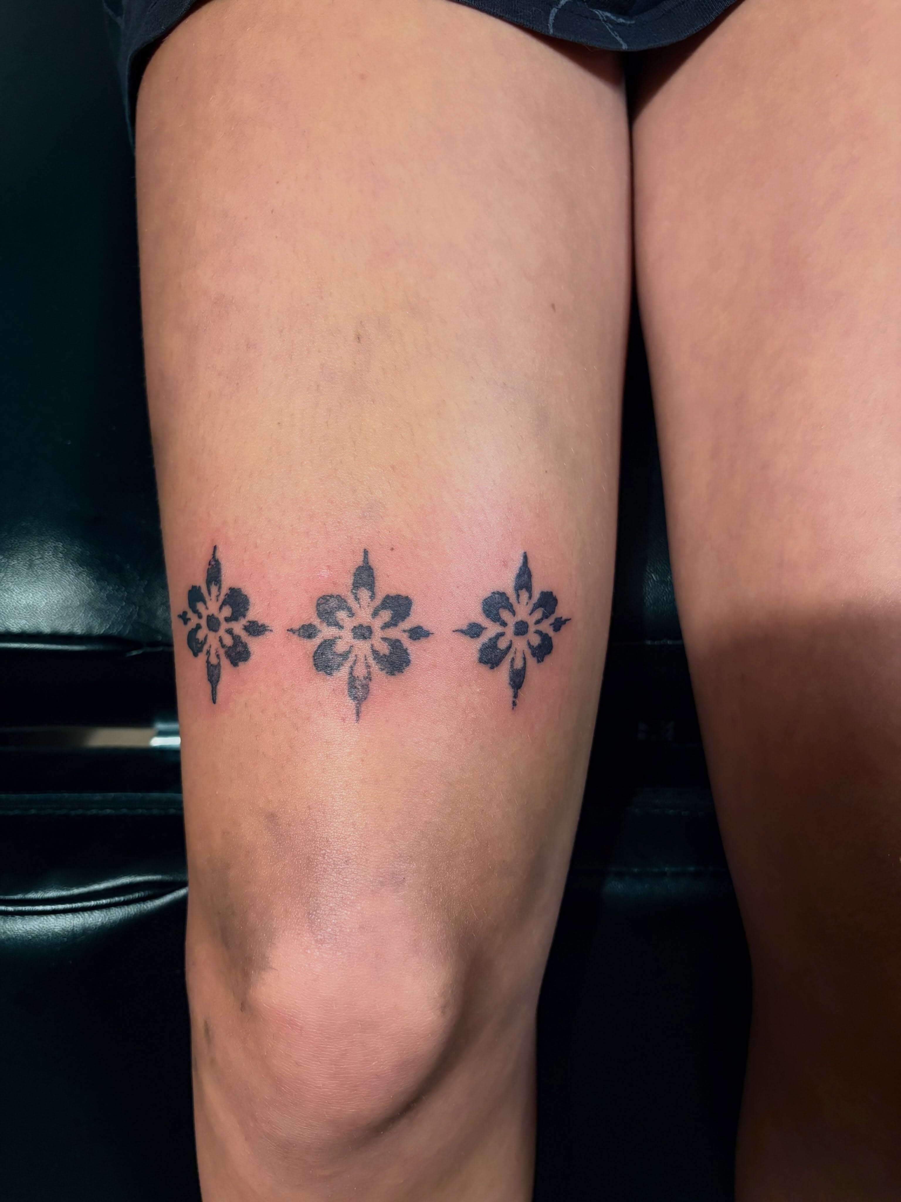 Floral pattern geometric tattoo on the calf by blastedbybk