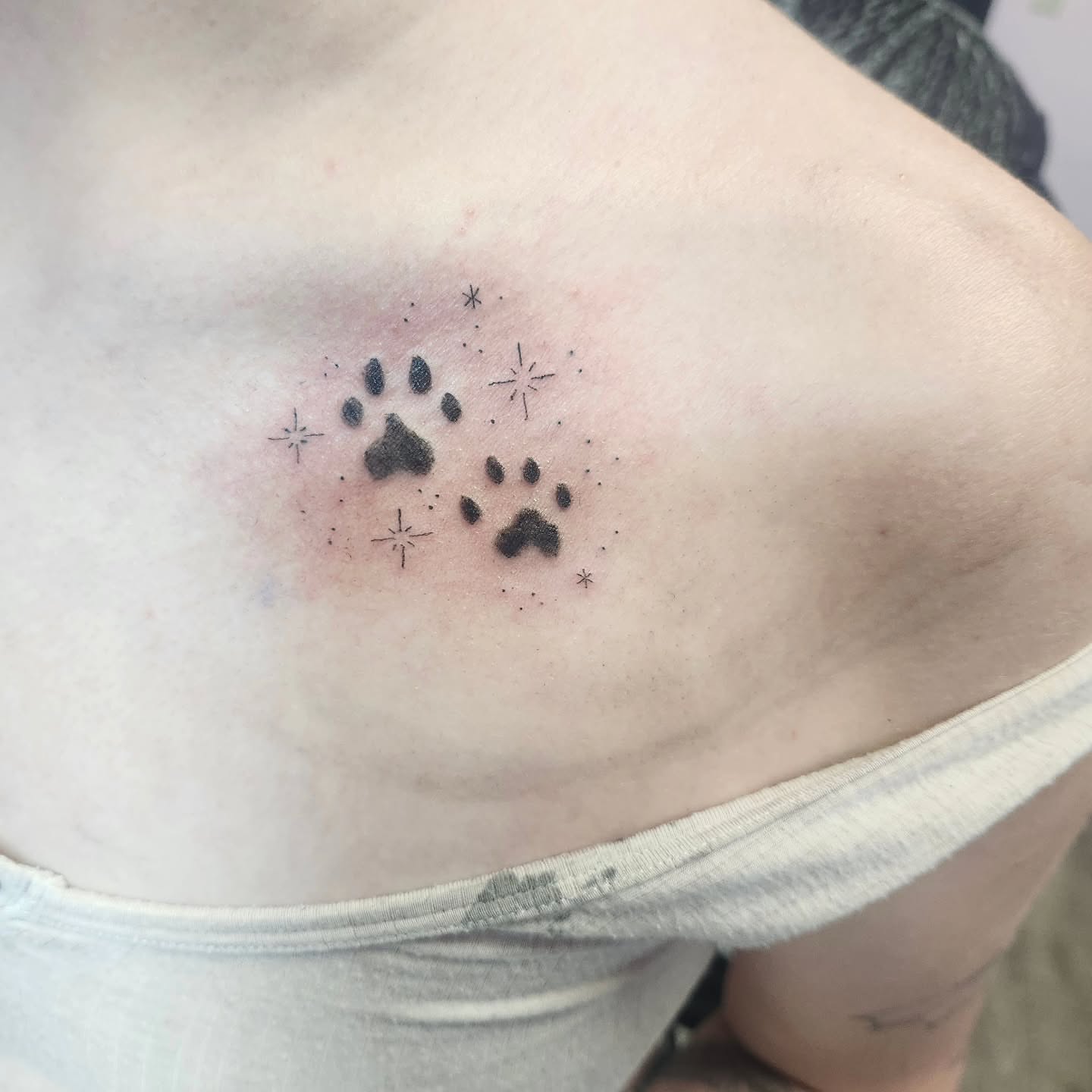 Paw prints dotwork tattoo on the shoulder by Meredith 🎈 Tattoo the Bride ✝️