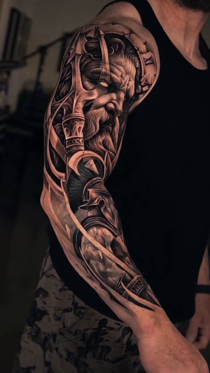 Greek god and clockwork realism tattoo by Vicman Tattoo