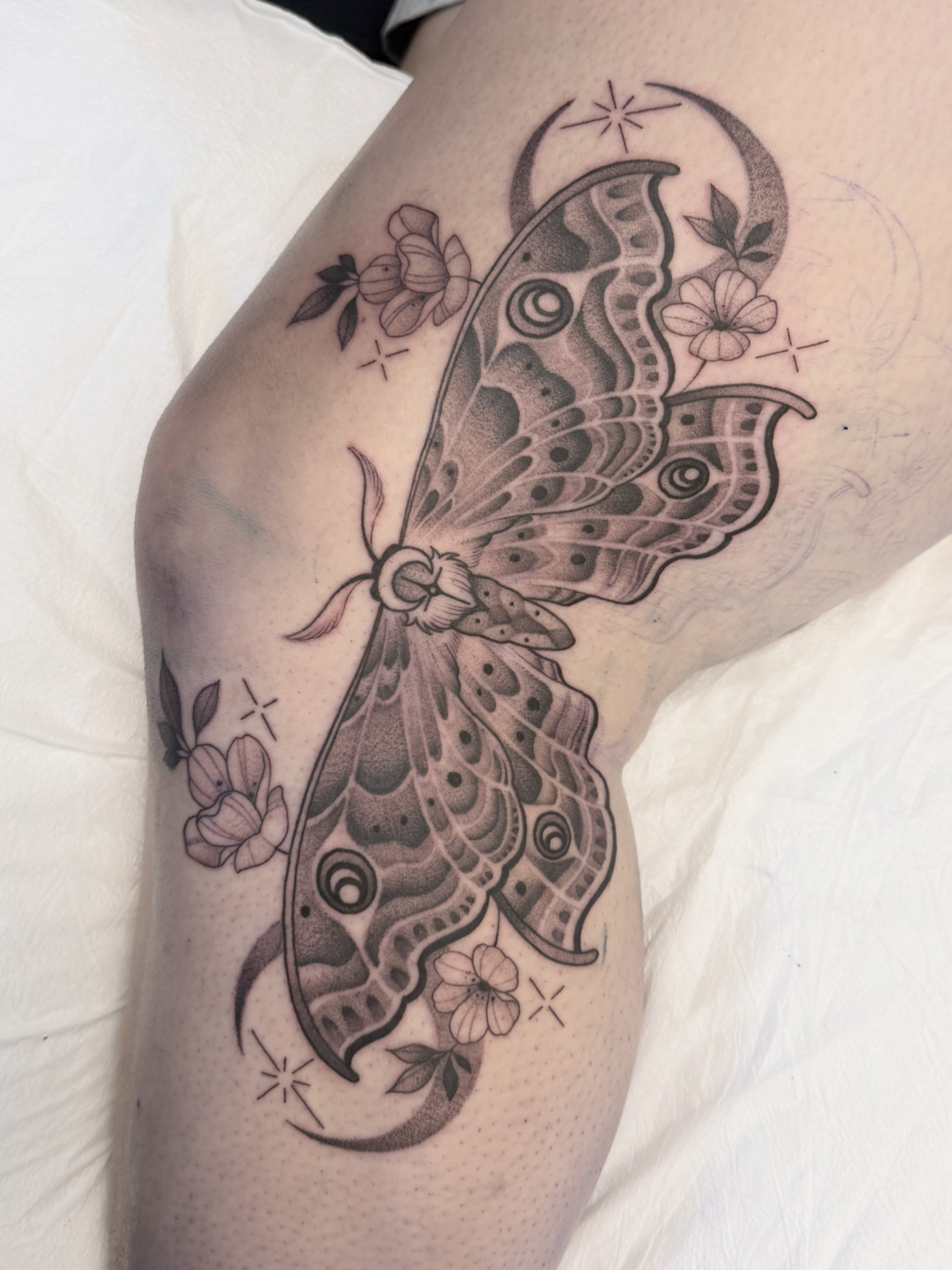 Butterfly dotwork tattoo on the thigh by Connie Fiorino - Tattoo Artist