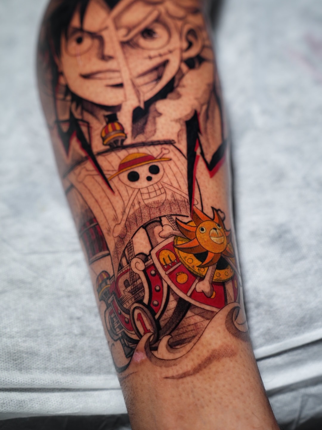 Pirate ship and skeleton anime tattoo on the forearm by CRISTIAN AMORES シ